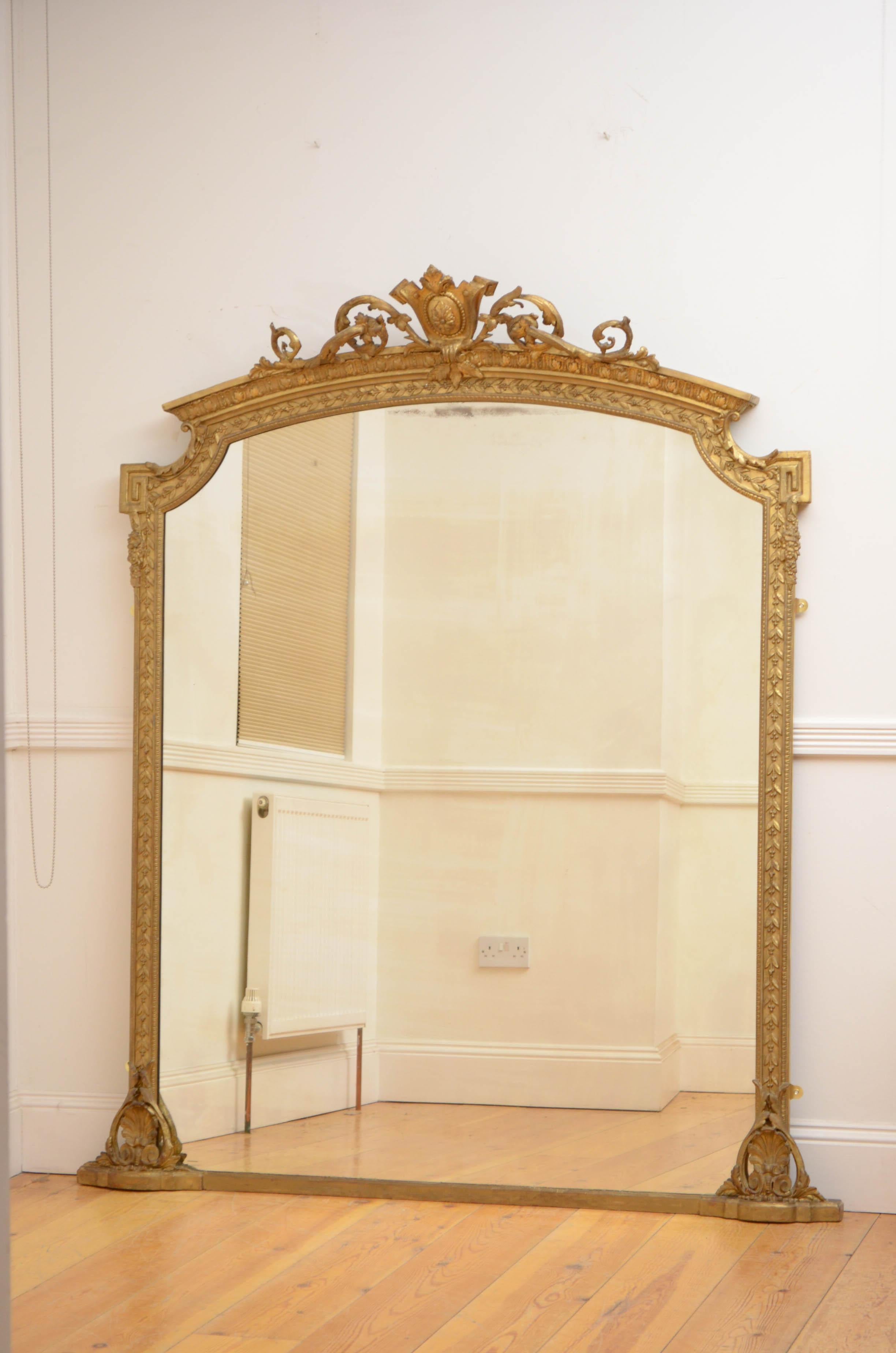 Sn5164 Superb early Victorian gilded wall mirror, having original glass with some foxing and imprecations in laurel decorated giltwood frame with shell scrolls to the base and foliage crest. This antique mirror retains its original glass, original
