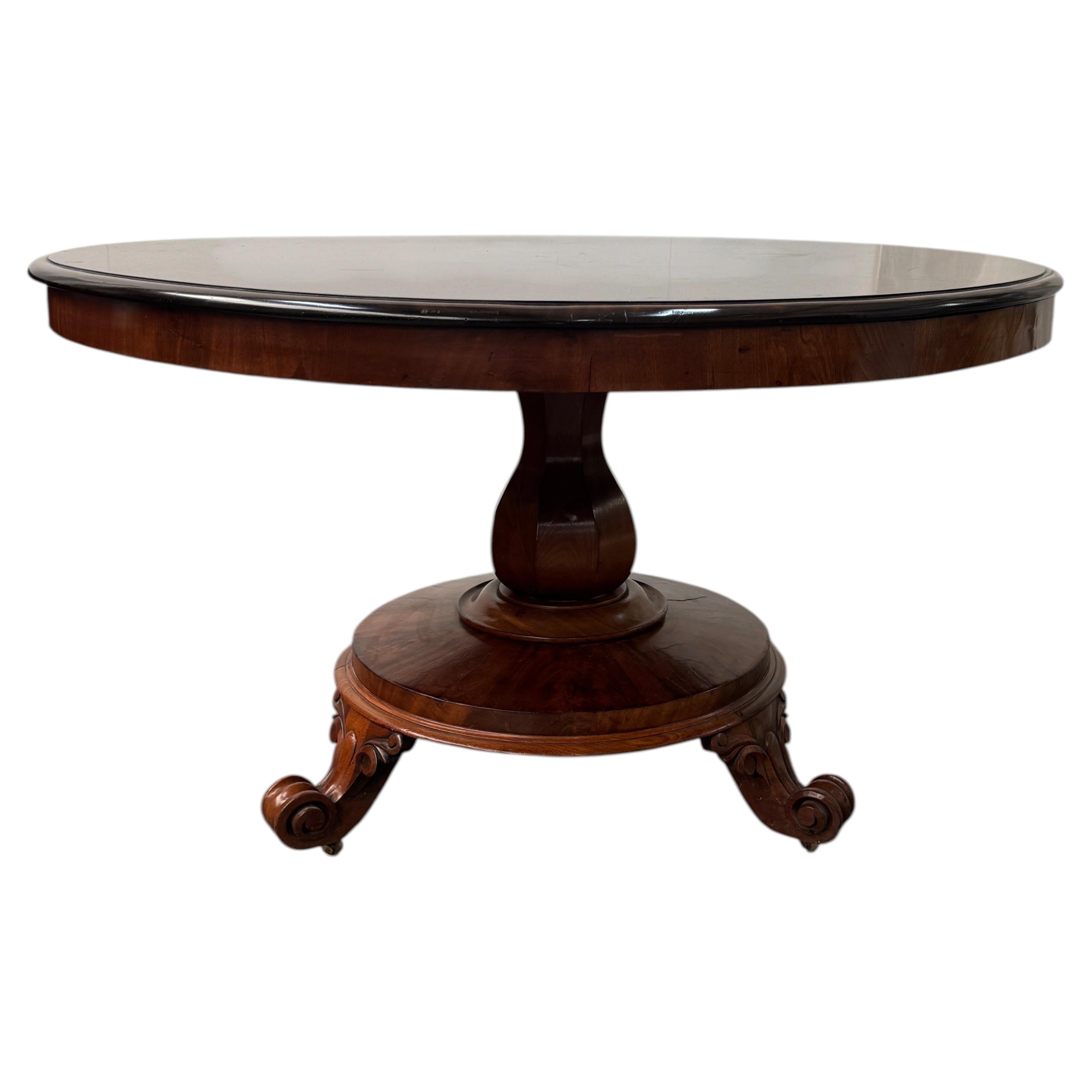 Gran mesa de comedor antigua de estilo Regencia inglesa, circular y con tablero abatible