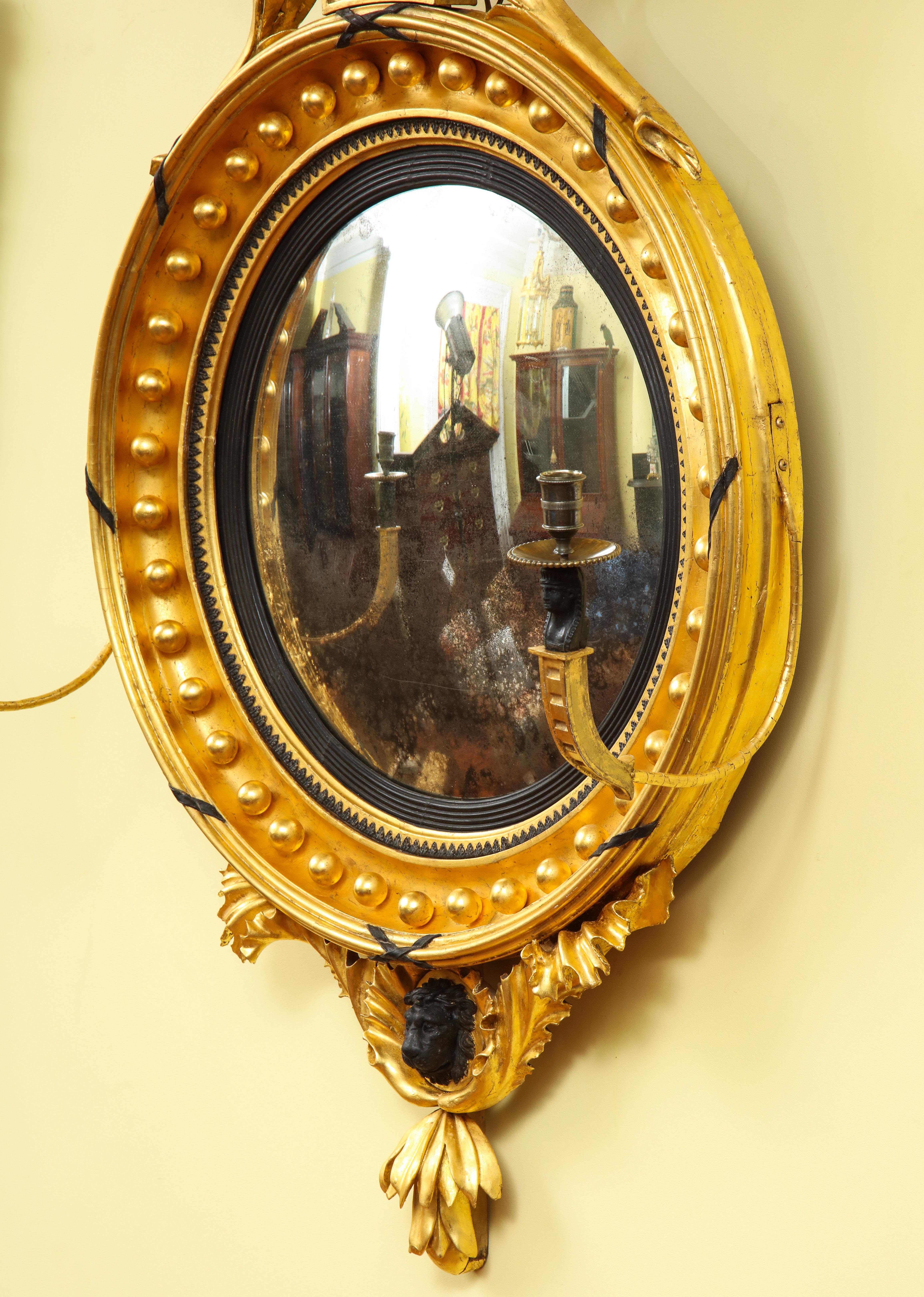 Large English Regency Carved Giltwood and Ebonized Convex Mirror, circa 1810 For Sale 1