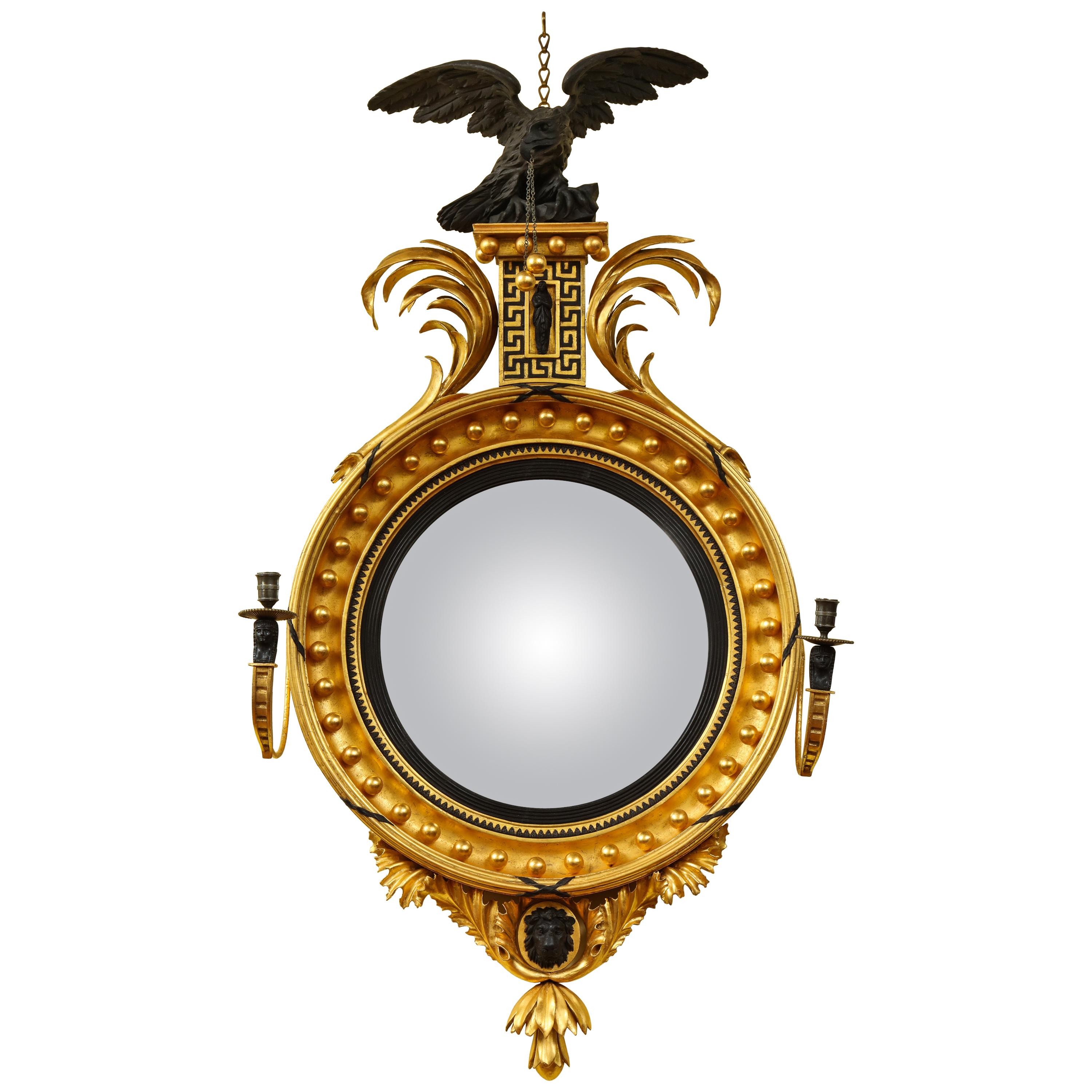 Large English Regency Carved Giltwood and Ebonized Convex Mirror, circa 1810 For Sale