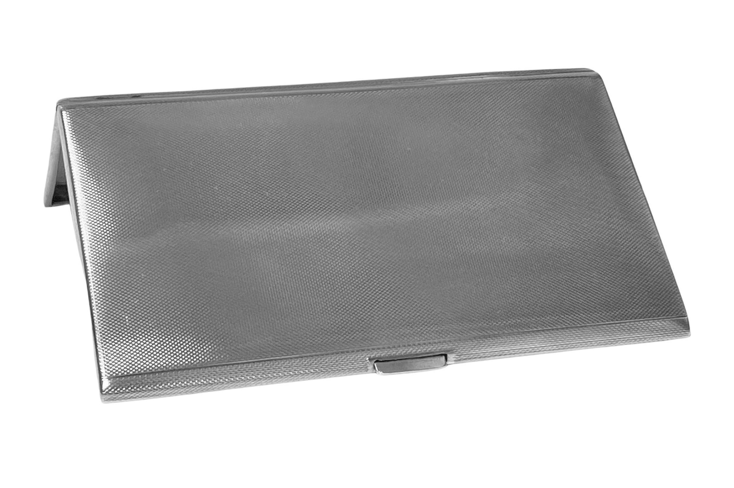 Large English sterling silver cigarette case Birmingham 1956, H. Pidduck and Sons. Unusual engine turned decoration design both exterior and interior. Fully hallmarked. Measures: 5.50 x 3.50x 0.38 inches. Item weight: 211 grams. Heavy gauge silver.