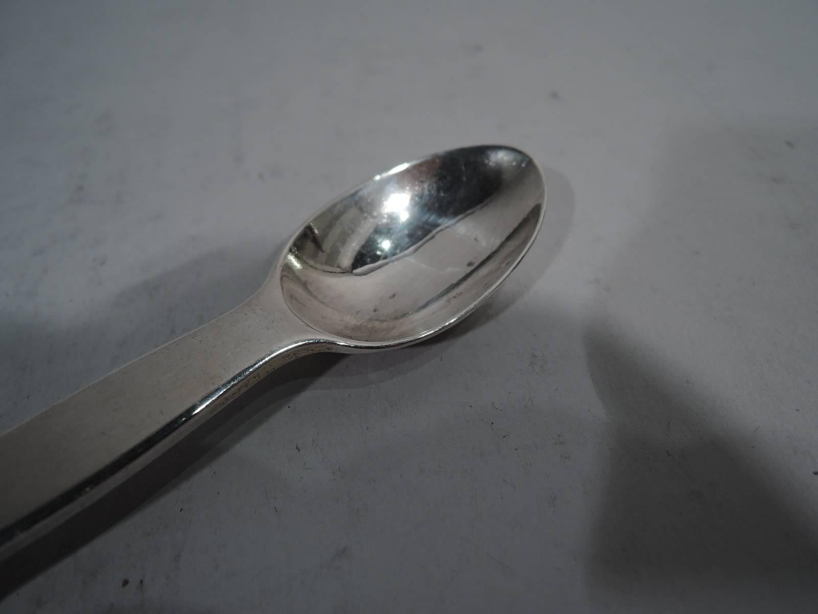 Edward VIII sterling silver medicine spoon. Made by Francis Higgins in London in 1936. Large and small bowls joined by gently curved stem. Sizes are approximately tablespoon and teaspoon. Convenient for home dosing. Hallmarked. Weight: 2 troy ounces.