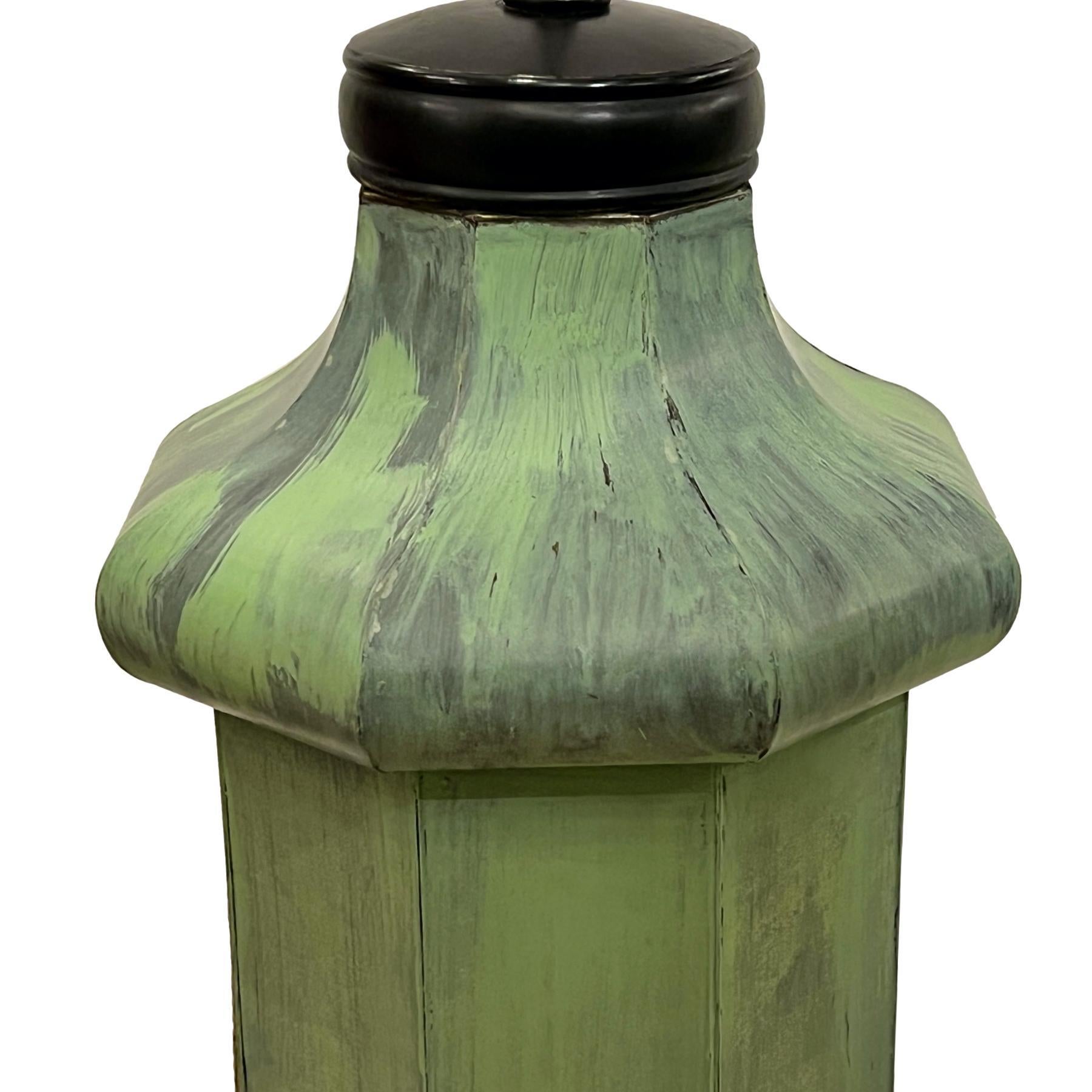A single large circa 1920's English tole lamp with original patina.

Measurements:
Height of body: 28
