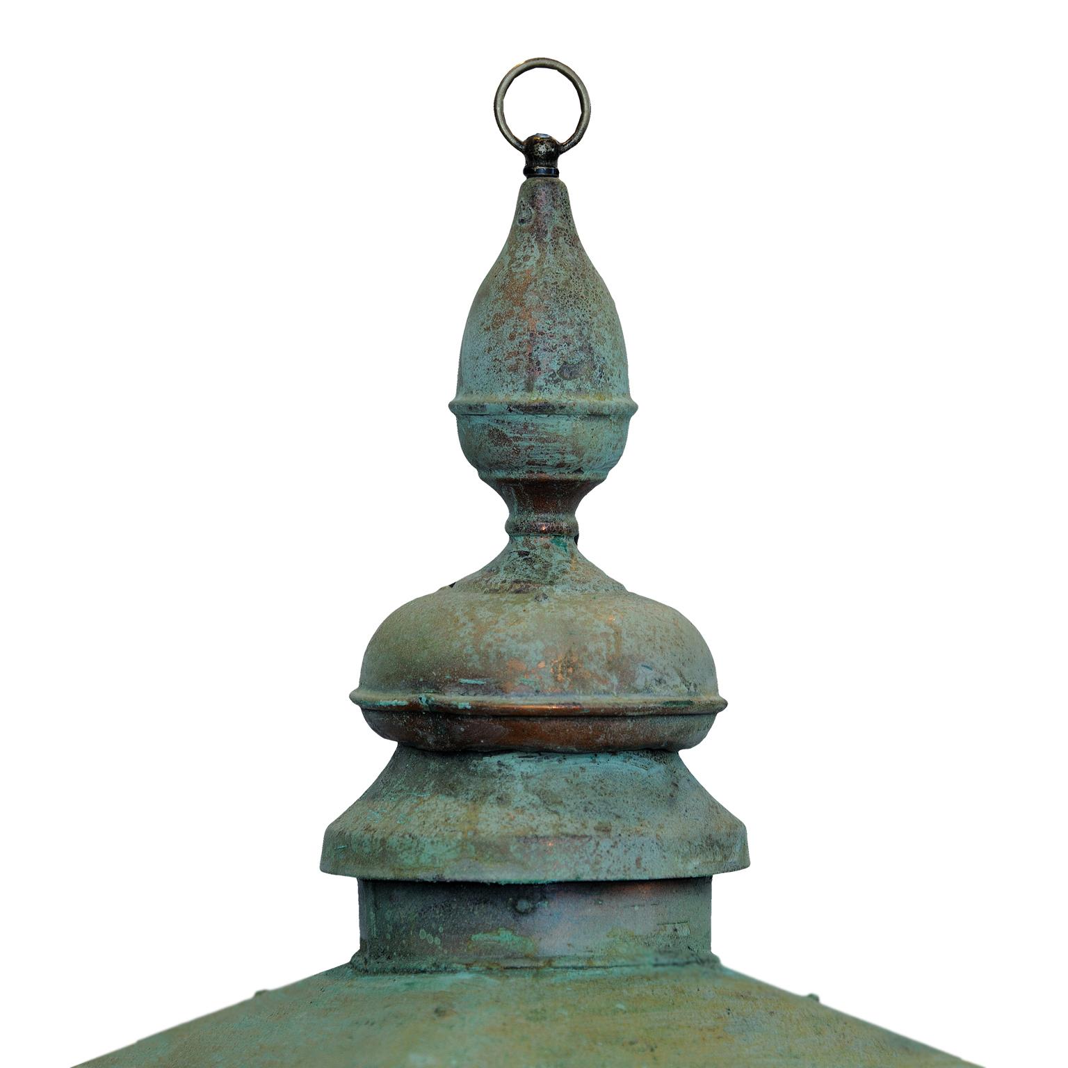 This is a large and very stylish mid-19th century English verdigris copper hanging lantern, now getting increasingly hard to source, converted to electricity and PAT tested, suitable for interior or exterior use. Complete with lions paw feet, circa