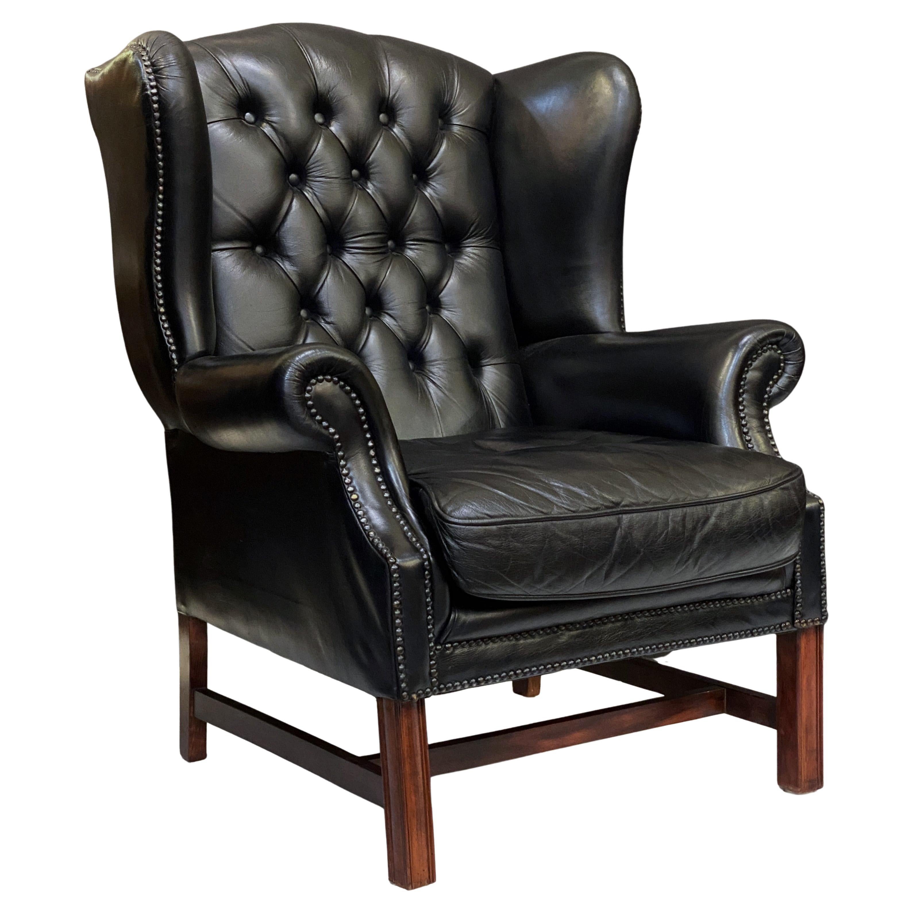 Large English Wing Back Chair of Black Leather in the George III Style For Sale