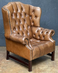 Large English Wing Back Chair of Tufted Tanned Leather with Nail-Head Trim