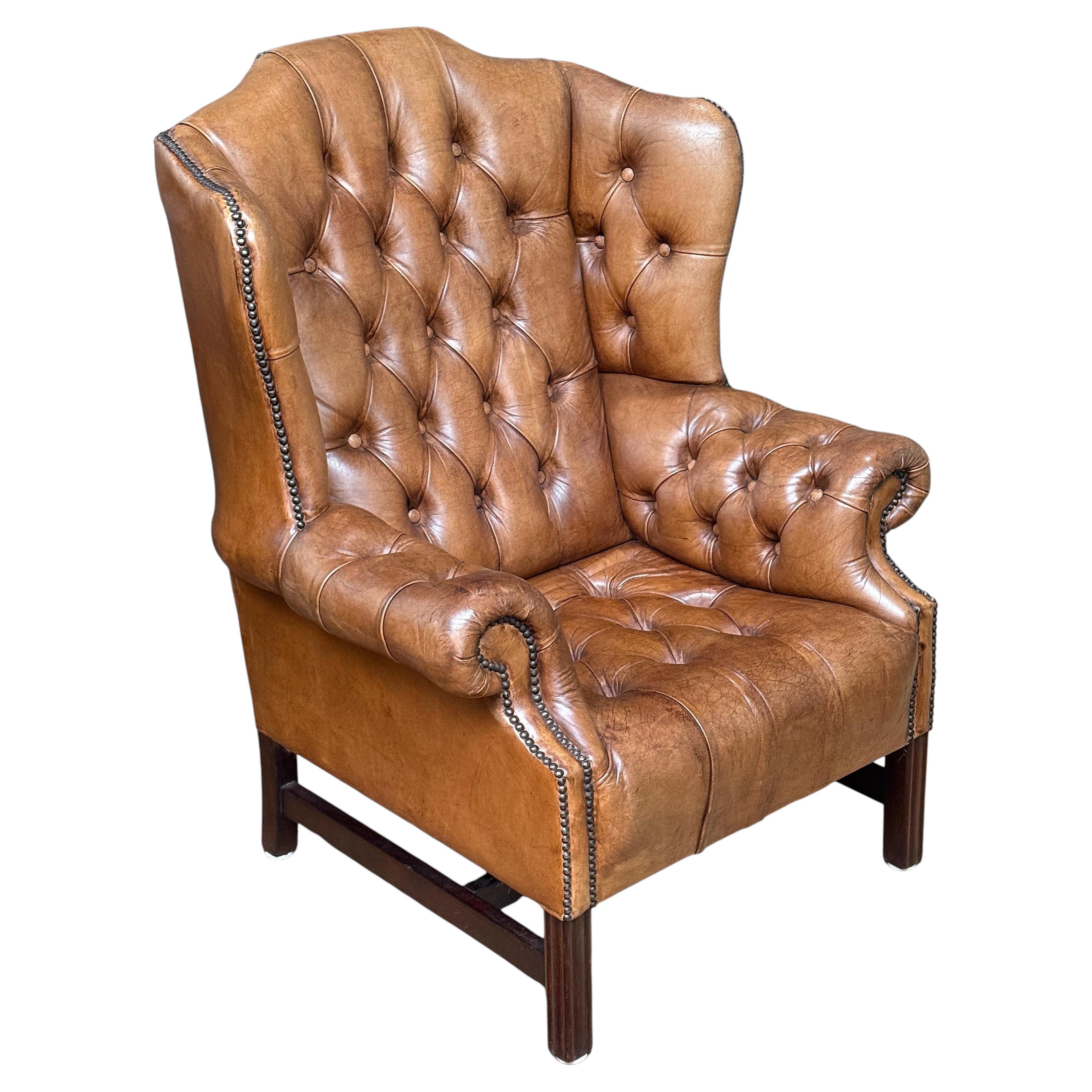 Large English Wing Back Chair of Tufted Tanned Leather with Nail-Head Trim