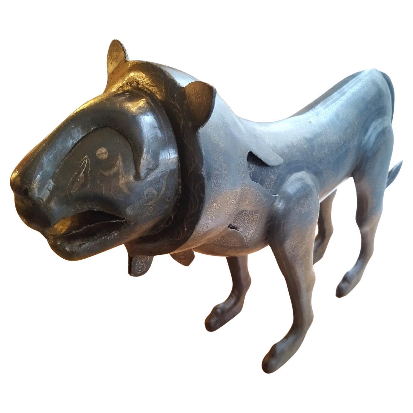 Large Engraved metal lion For Sale