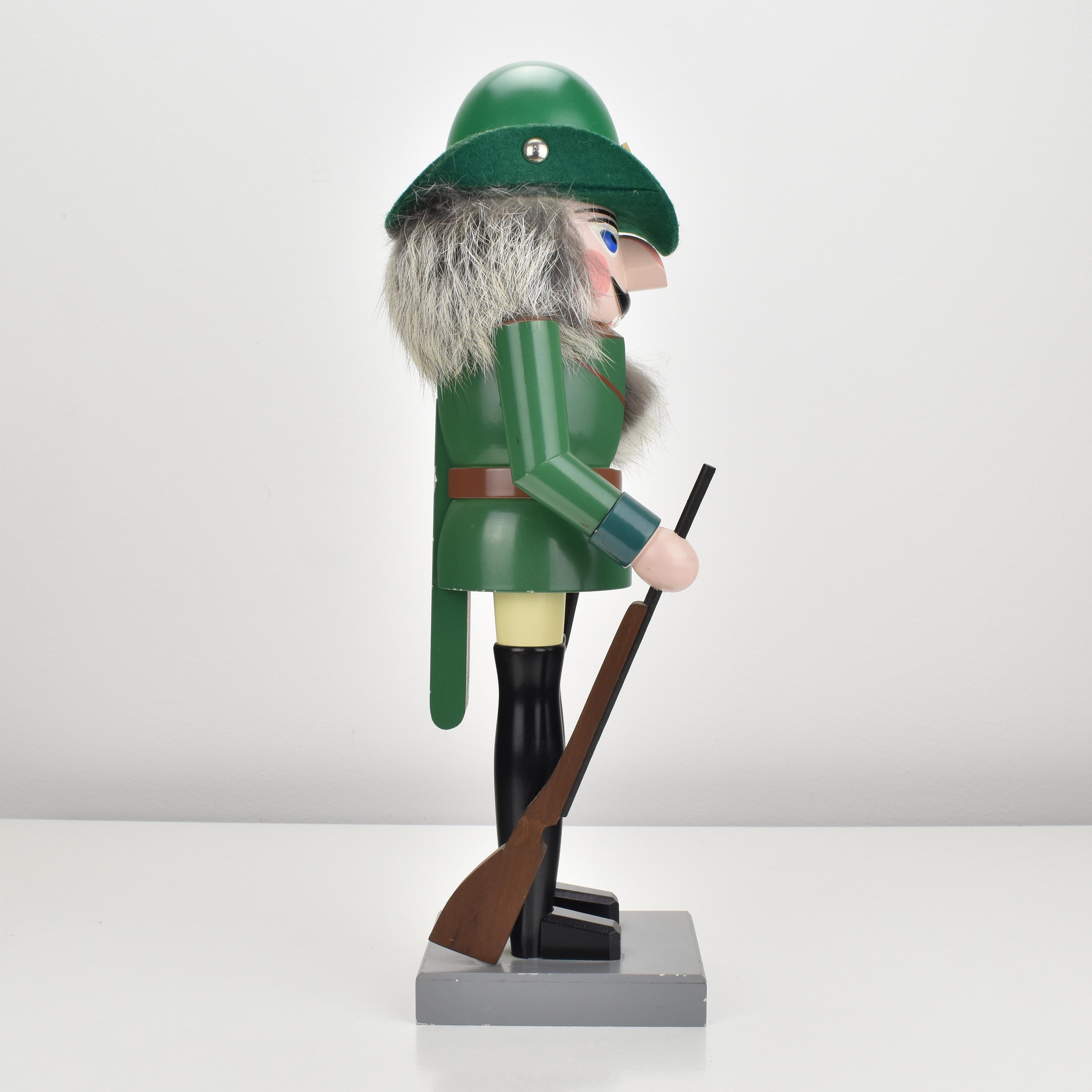 Hand-Crafted Large Erzgebirge Christmas Nutcracker Hunter Decoration Piece Germany 1970s For Sale