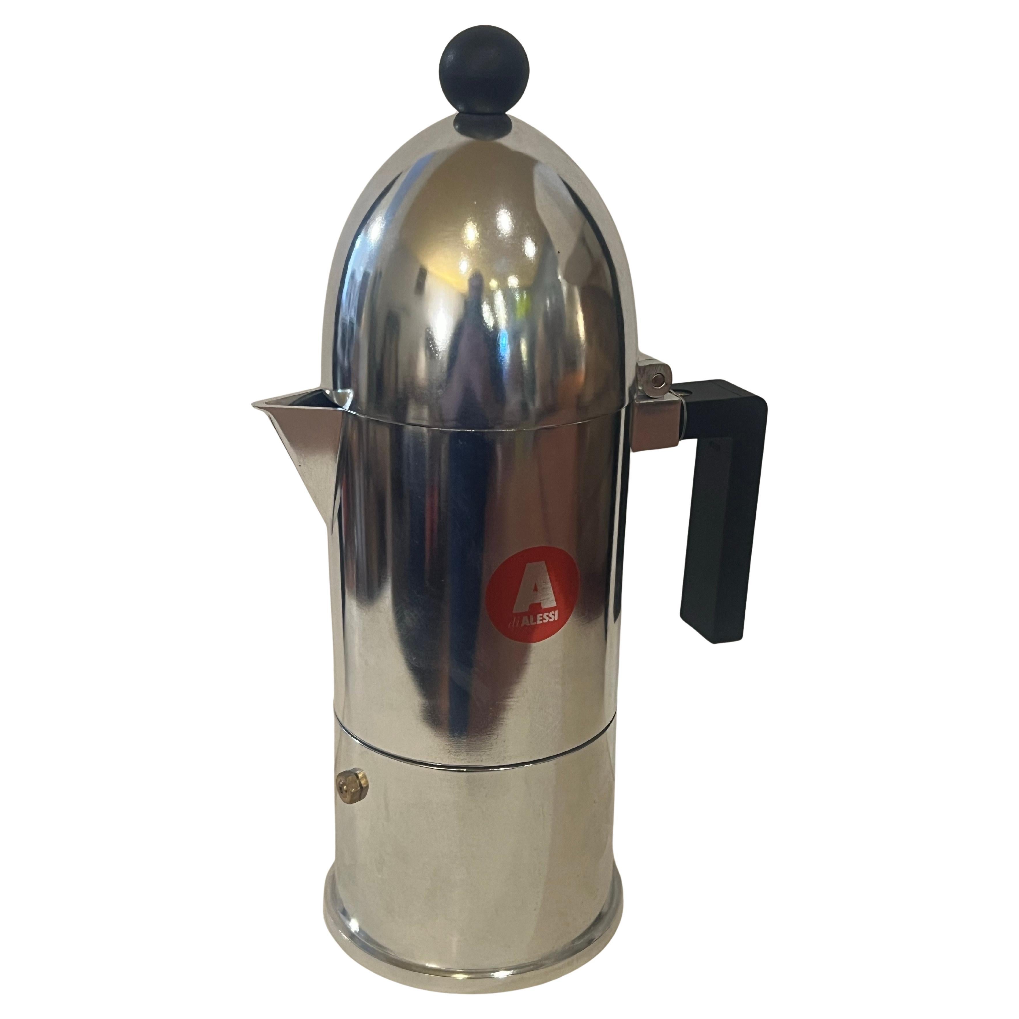Great design early production in polished aluminum finish color finish large espresso maker designed by Aldo Rossi for Alessi, circa 1988, six cup capacity the design after Italian churches called La cupola. Nice condition and working pouring great