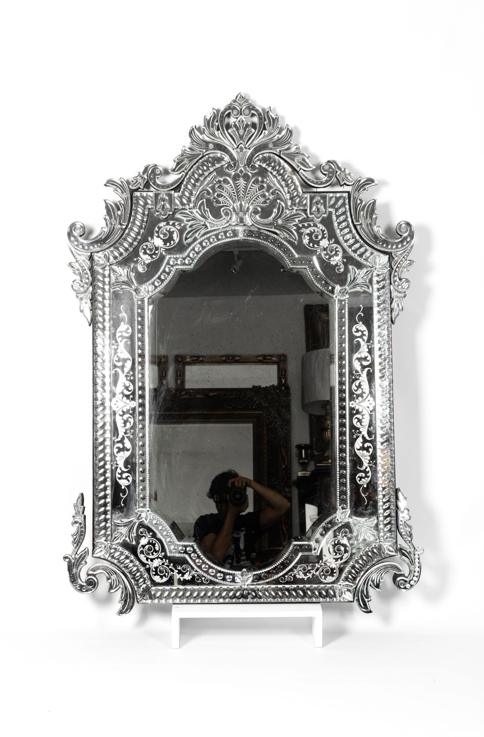 Large rectangle etched glass framed Venetian fire mantel hanging wall mirror. Topped with intricate openwork pediment. Excellent antique condition. Minor losses and wear consistent with age or use. The hanging mirror measure about 60 inches length X