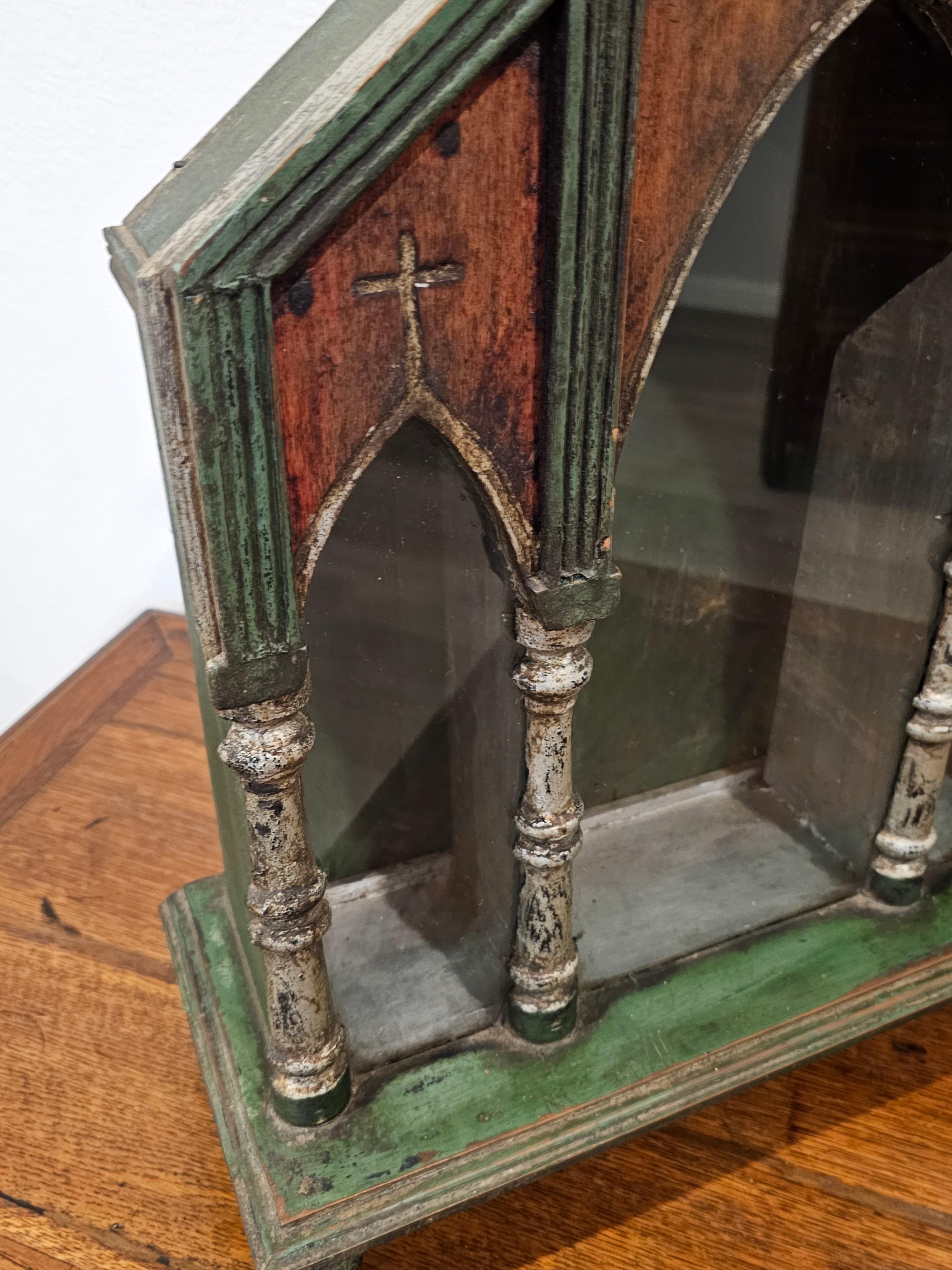 a tiny niche in front of the altar relics