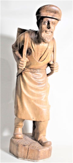 Large European Folk Art Carved Wooden Standing Man Carrying a Basket Sculpture
