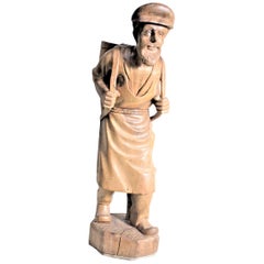 Antique Large European Folk Art Carved Wooden Standing Man Carrying a Basket Sculpture