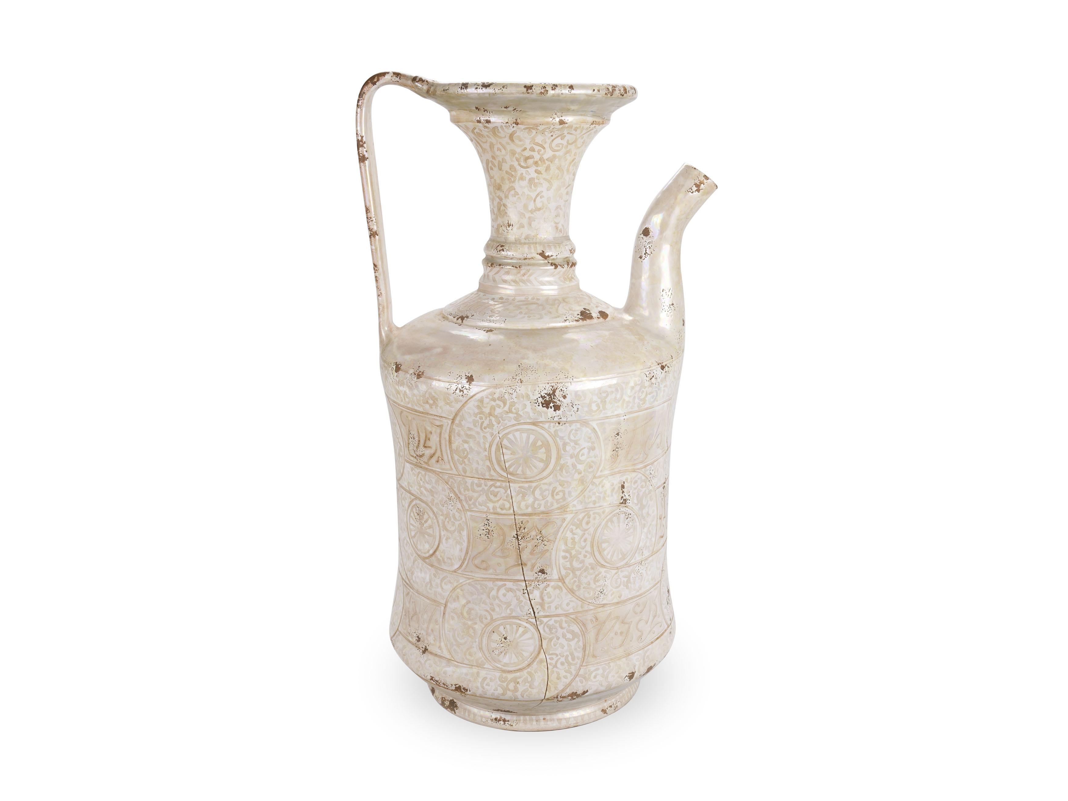 Magnificent large decorative ewer, handmade and hand-painted in Italy by the artist G. Mengoni for deBlona. His creativity was inspired by Middle Eastern ceramic tradition, whose ornamental features the artist wisely combined with