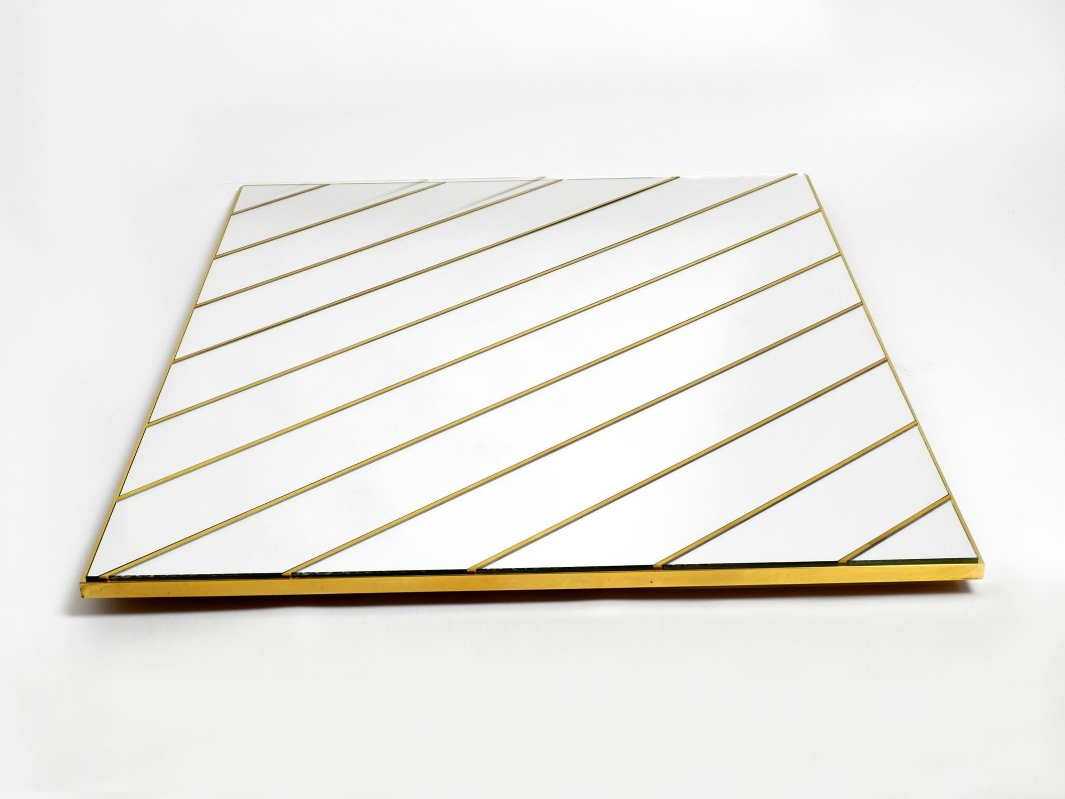 Regency Large, Exceptional 1970s Brass Wall Mirror with Diagonal Mirror Strips For Sale
