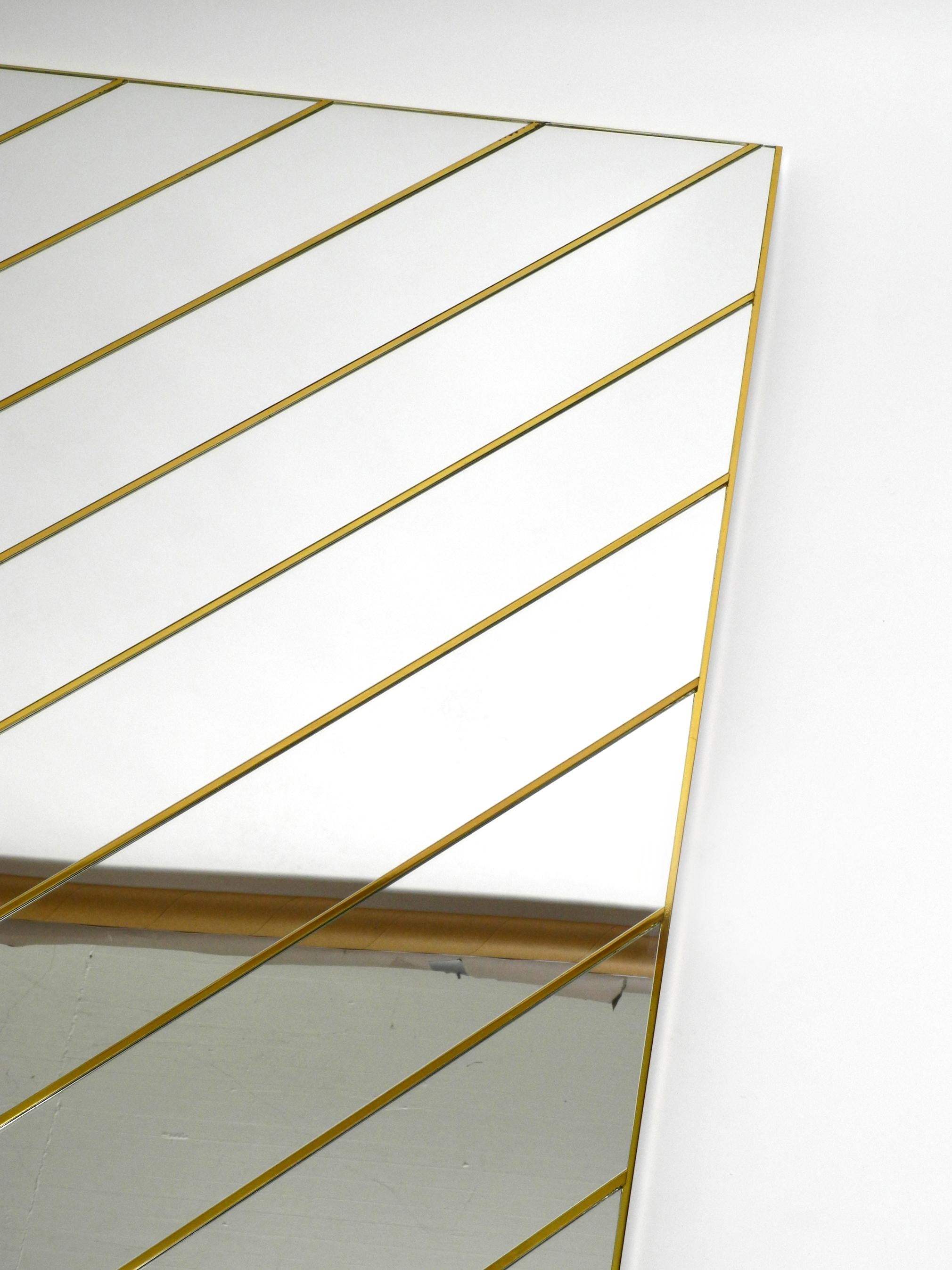 Italian Large, Exceptional 1970s Brass Wall Mirror with Diagonal Mirror Strips For Sale