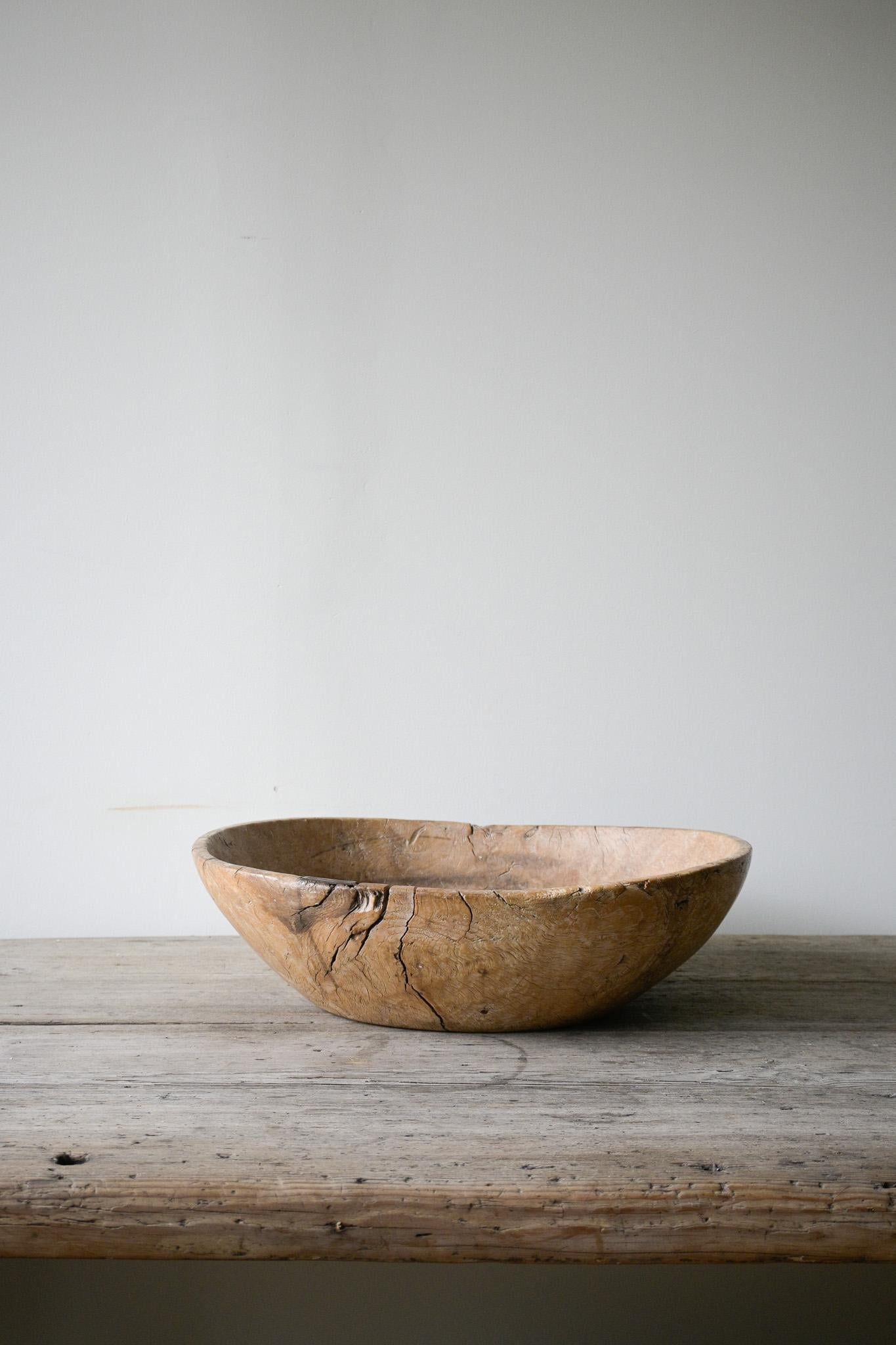 Large Exceptional Norwegian Burl Birch Bowl, ca 1780–1830

It’s hard to do this magnificent bowl justice through photos alone.

The beautiful fire burl birch pattern and silky-smooth patina — along with its old cracks and historic iron repair — give