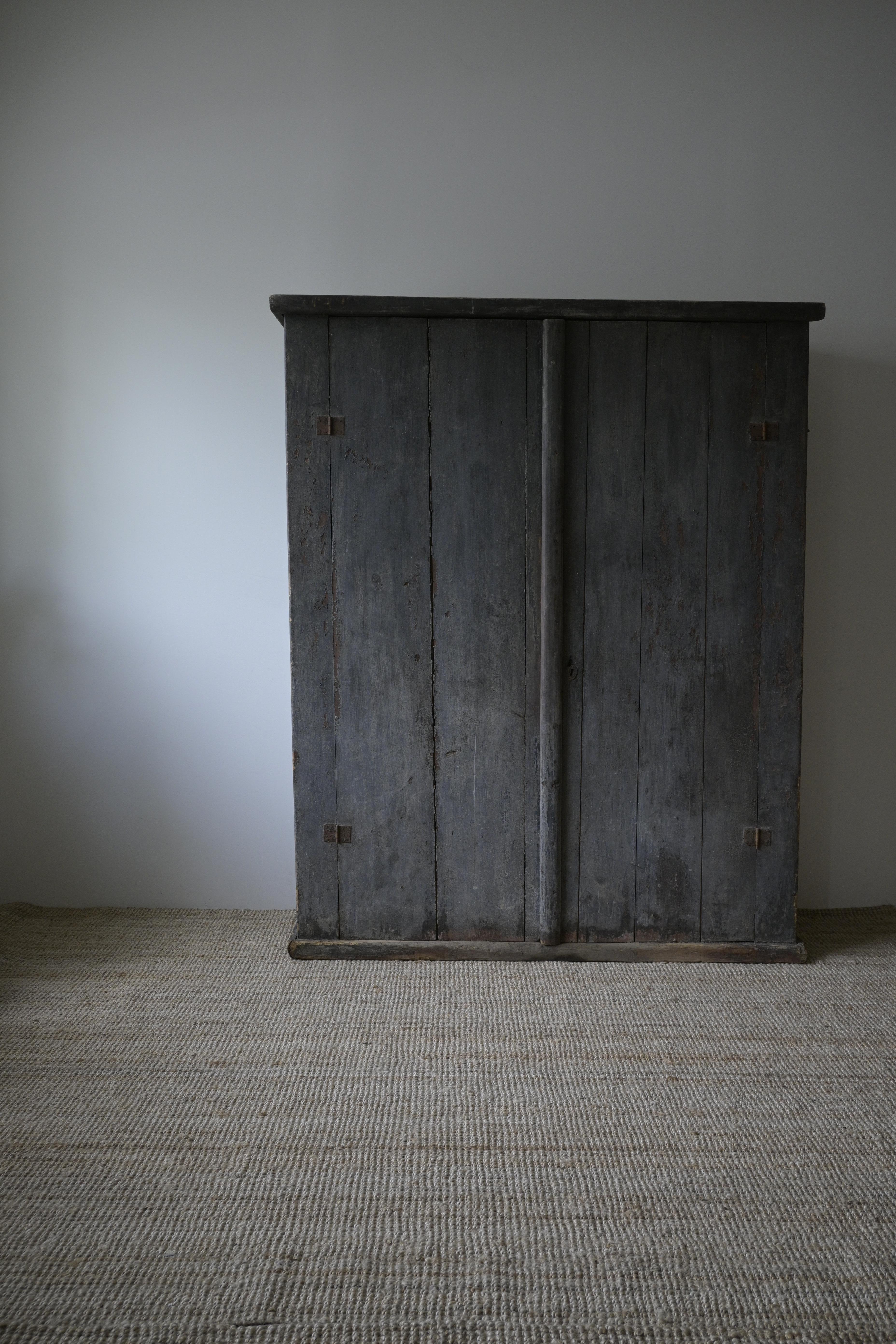 Large Exceptional Swedish Cabinet, circa 1920

A beautiful and characterful piece with rich patina and natural wear from age and use.

Painted in a soft blue tone that shifts between light and dark depending on the light. Over time, exposure to sun