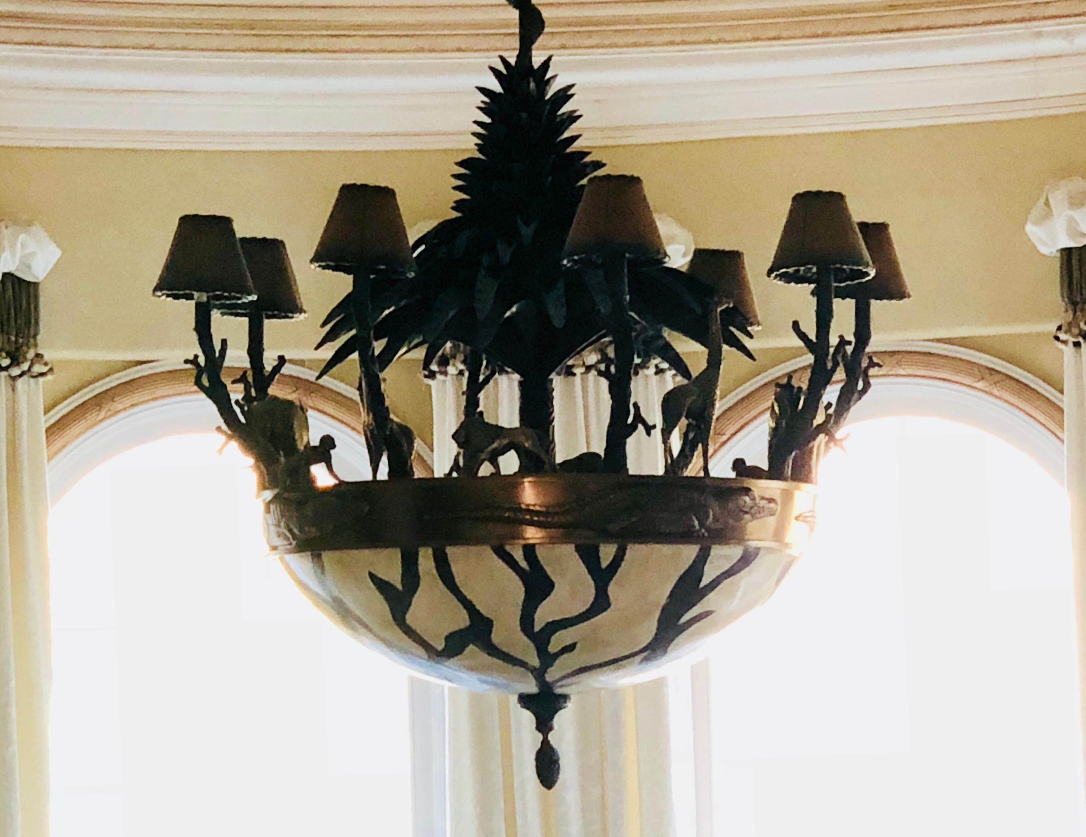 Magnificent, large scale, handmade artisan, estate chandelier features a bold zebra patterned, crackle finish, large round translucent domed bowl. Chandelier frame is a patinated bronze and verdigris brass. It is topped with a repeating motif of