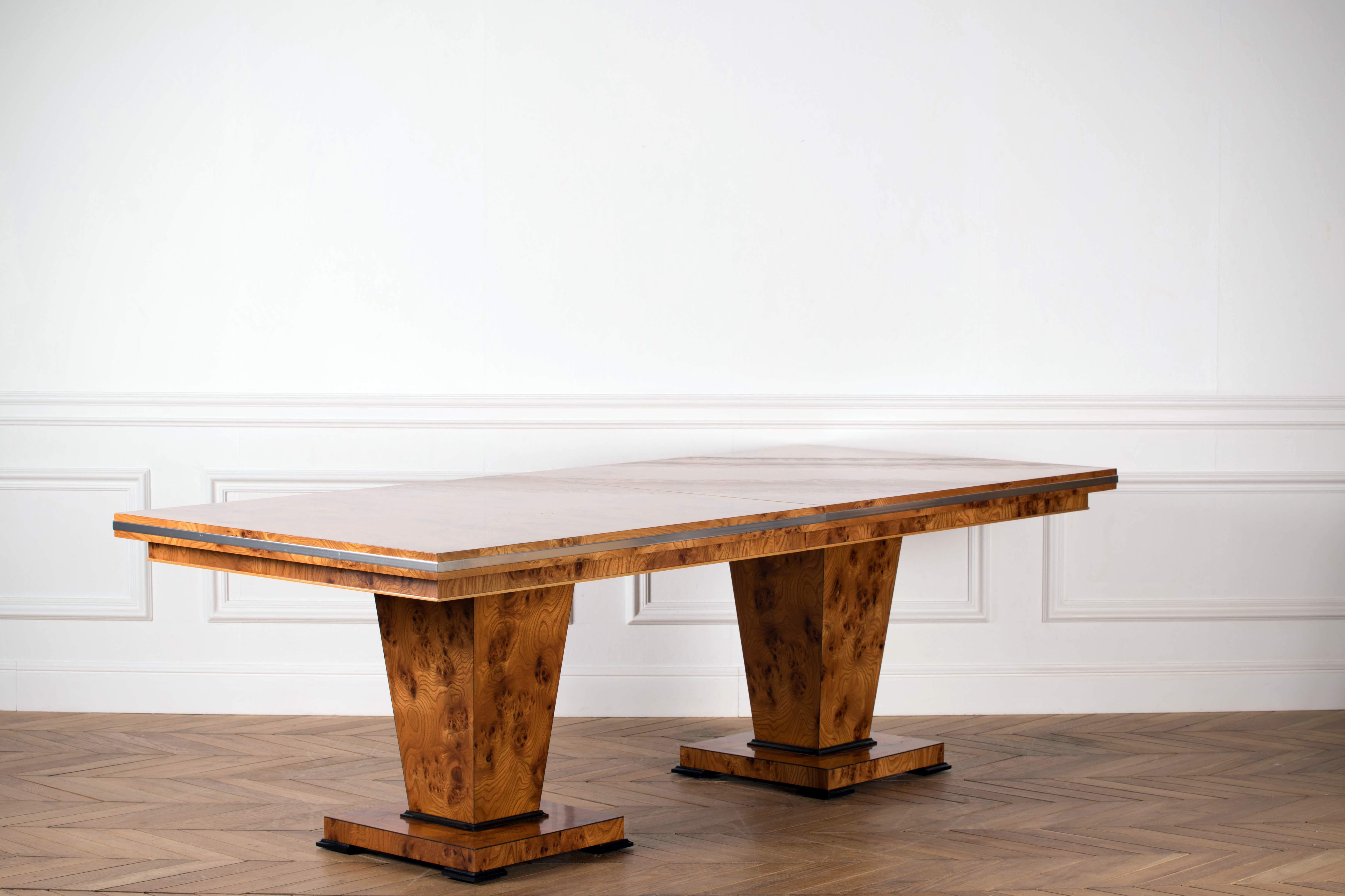 Art Deco style table labelled by Restall Brown and Clenel, late 20th century in date. Art Deco is a style of visual arts, architecture and design that first appeared in France just before World War I. It combined modernist styles with fine