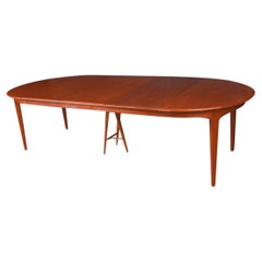 Large extendable Danish teak dining table model 62 by Henning Kjaernulf 1960.