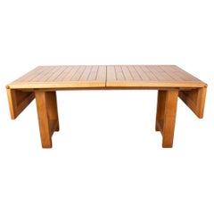 Large extendable dining table in solid oak by Guillerme and Chambron 1960.