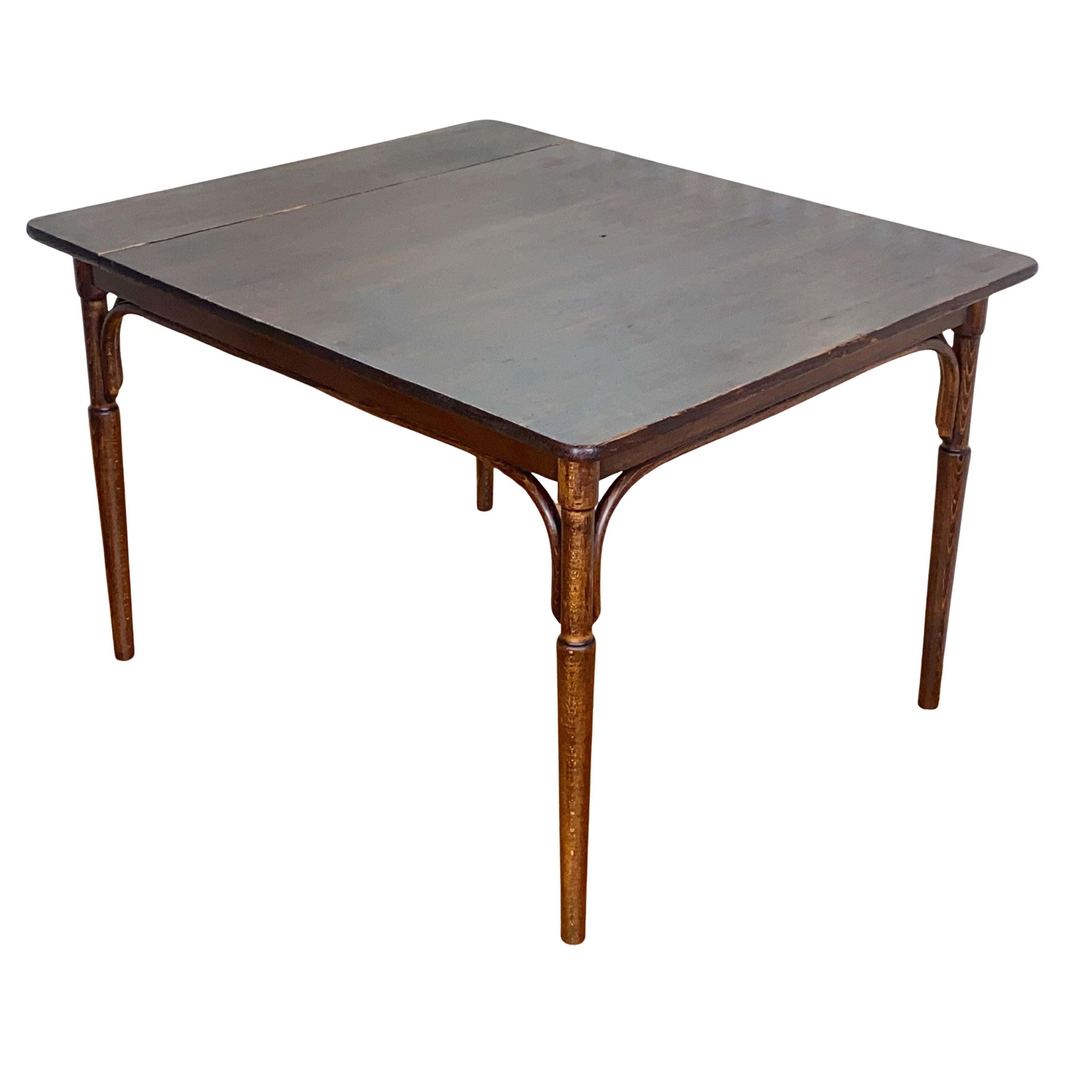 Solid and compact. It is marked with a Thonet label of the 2nd type (1881-1919). Under the layers of non-original paint, the original surface finish of the base has been very well preserved, which was cleaned and polished with shellac after the