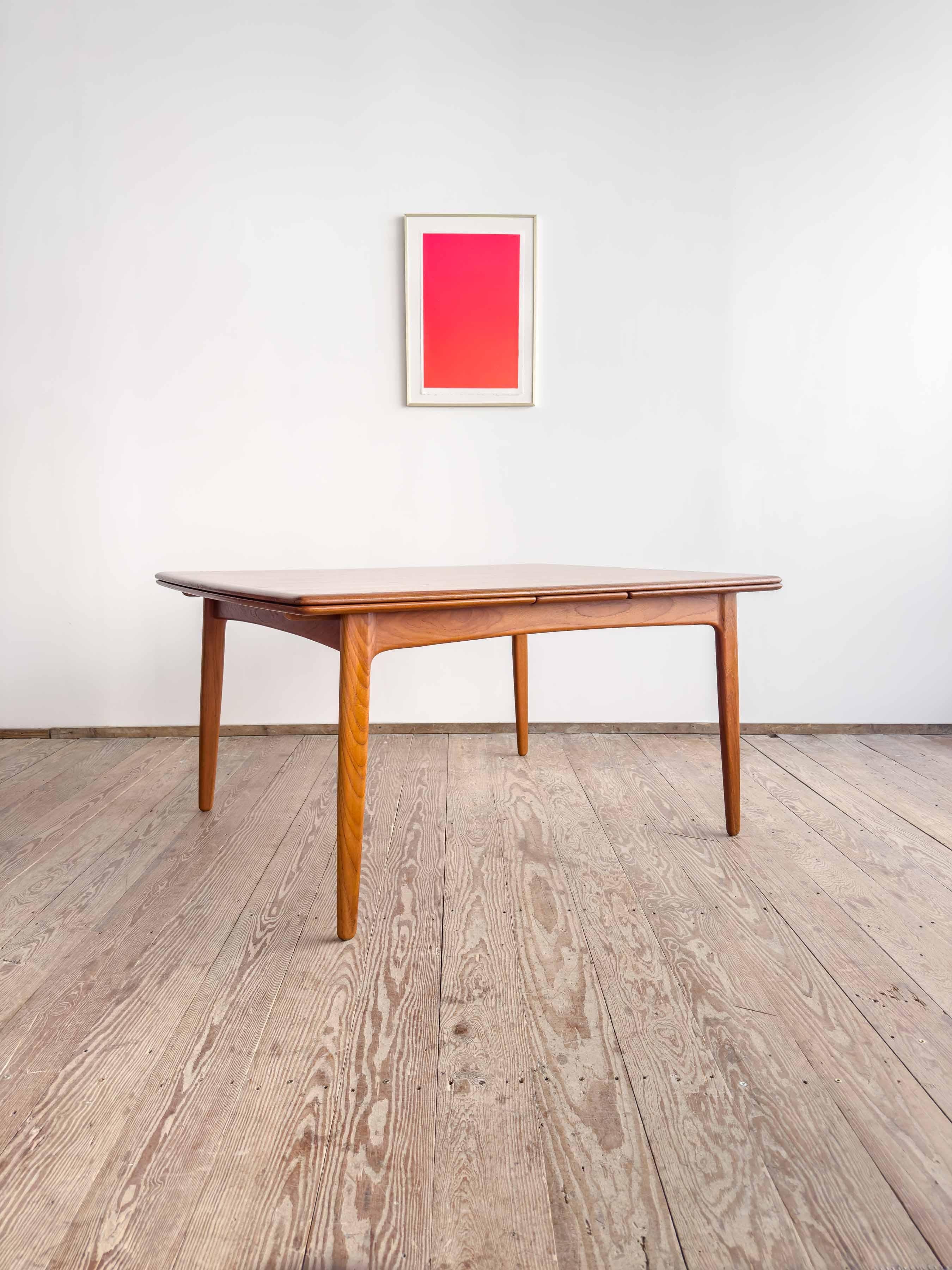Dimensions: 146 / 204 / 262 x 112 x 72.5 cm

(Length / Extended / Fully Extended x Width x Height)

(approx. 57.5 / 80.3 / 103.1 x 44.1 x 28.5 inches)

This very elegant Danish dining table was designed by Svend Aage Madsen and crafted by K. Knudsen