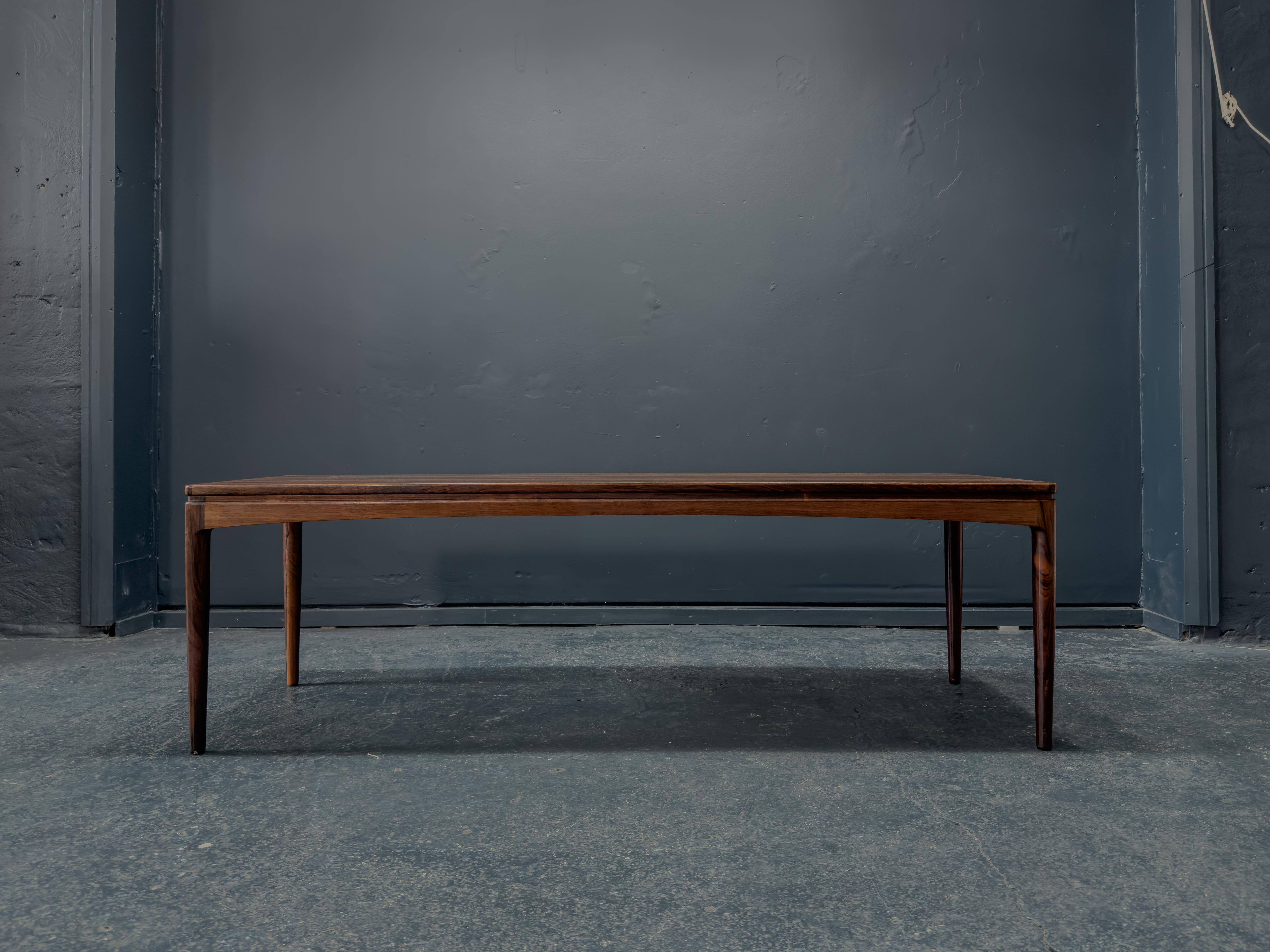 This incredible coffee table boasts and impressive size, with a compact depth making it a very versatile piece for any space. Made from hardwood it has a stunning colour and rich deep grain running through, beautifully highlighted on the table top.