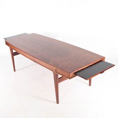 Grande table basse extensible en bois de rose