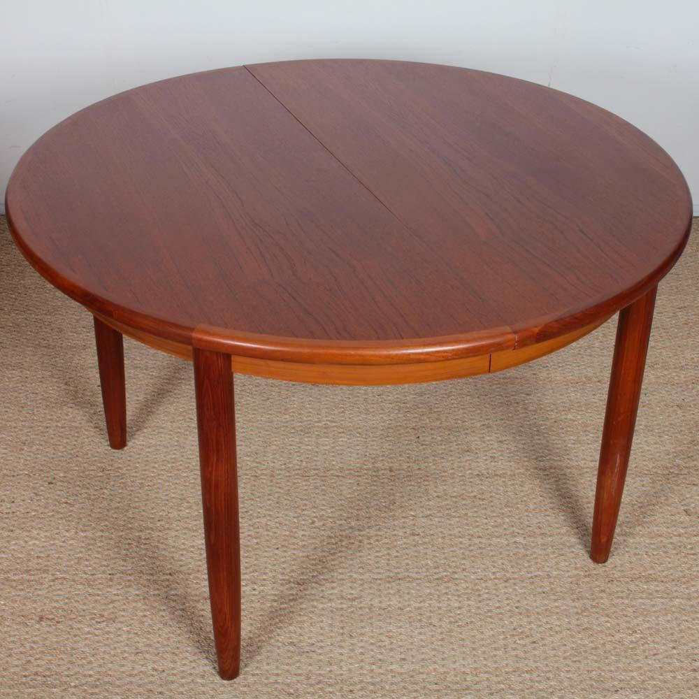 Metà XX secolo Large extendable round teak dining table, 1960 in vendita