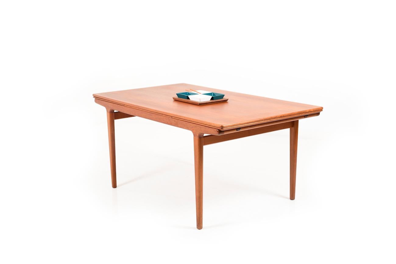 Danish Large Extendable Teak Dining Table by Johannes Andersen for Uldum Møbelfabrik For Sale