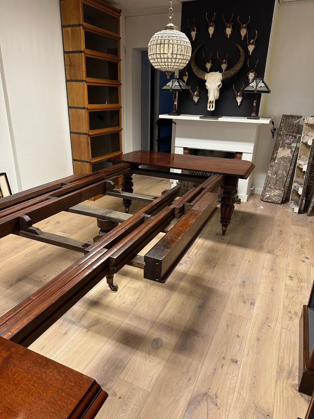 Large extending dining table For Sale 2