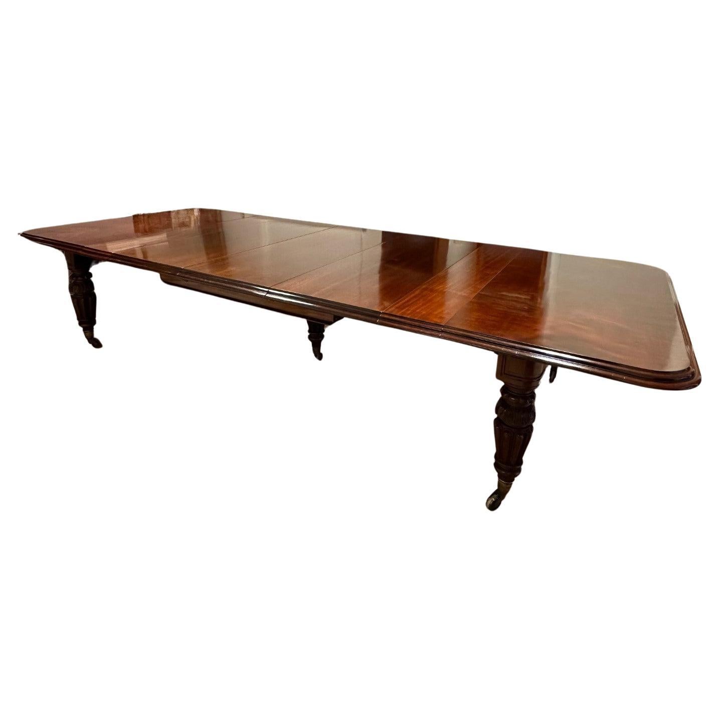 Large extending dining table For Sale