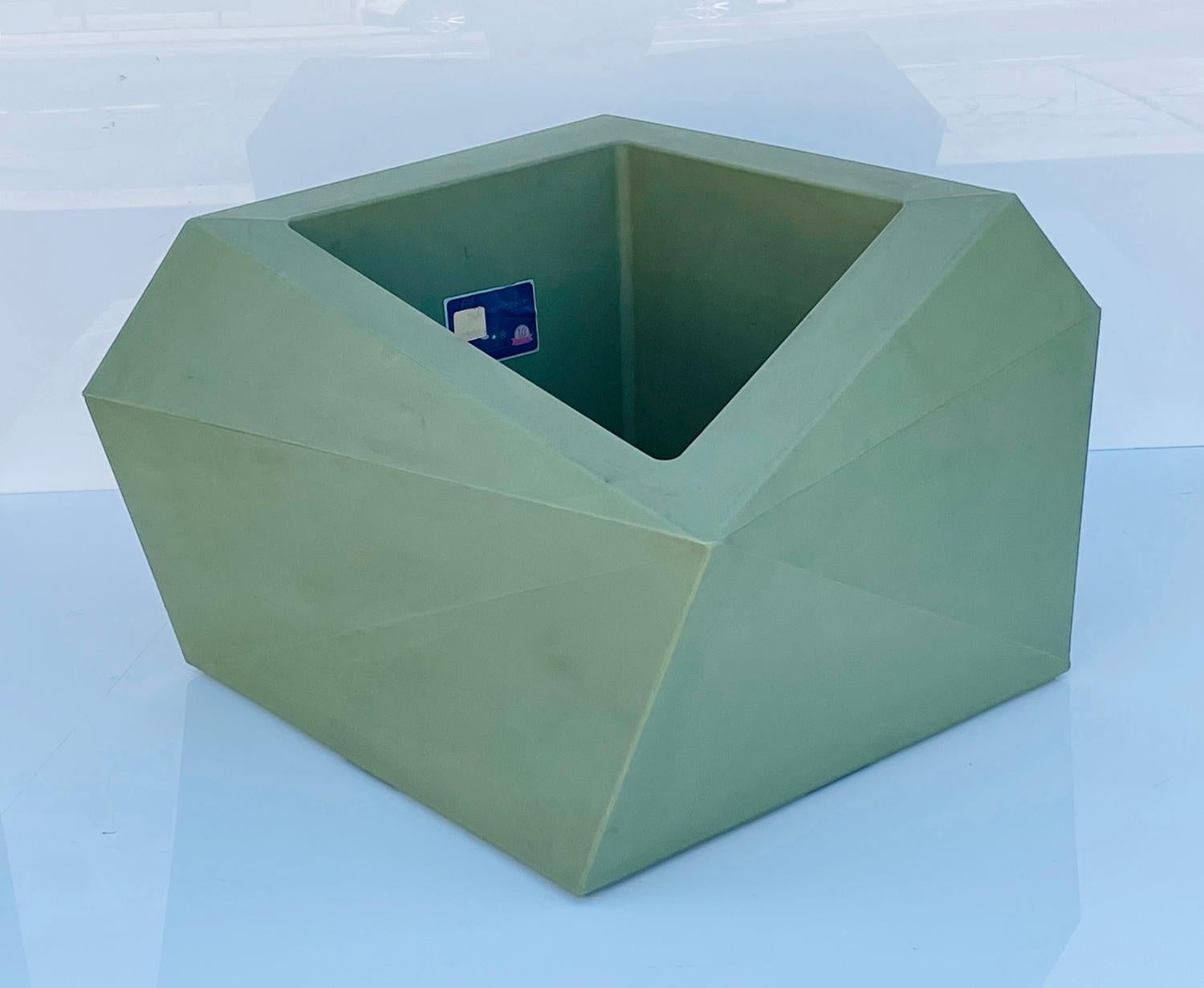 Incorporating modern architecture into a practical gardening essential, this faceted Planter will display beautifully in any room in your home.

The tall faceted planter lends itself effortlessly to sleek style, tying right into your current decor