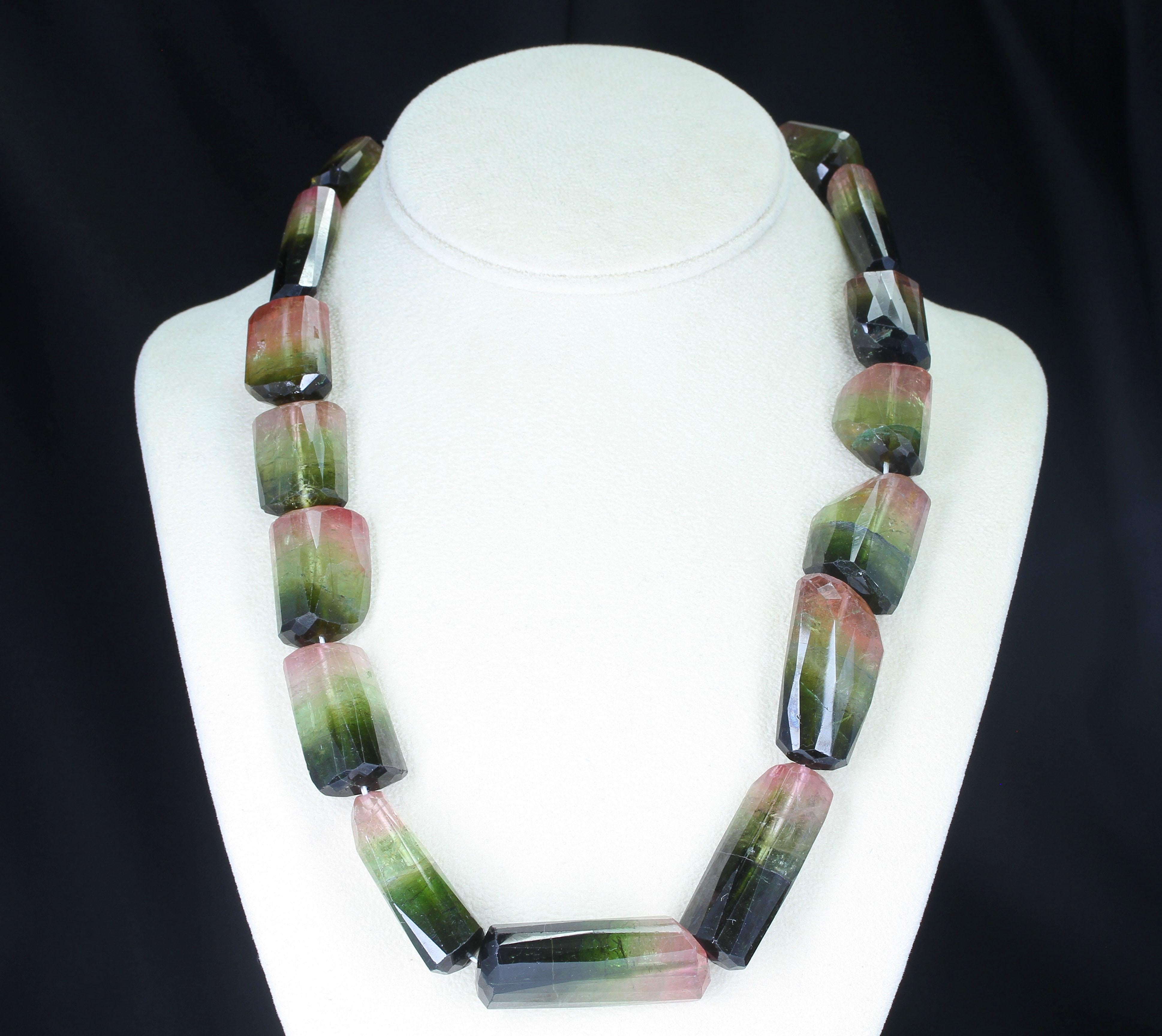 A statement necklace of Large Faceted Rectangular Bi-Color Tourmaline Beads with a Tourmaline Clasp. The length is 21.5