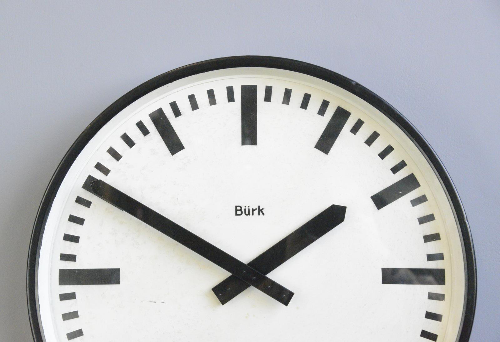 Large factory clock by Burke, Circa 1950s

- Steel casing 
- Tin dial with glass face
- Original hands
- New AA battery powered quartz motor
- Made by Burke
- German, 1950s
- Measures: 56cm wide x 10cm deep

Condition report:

Fully