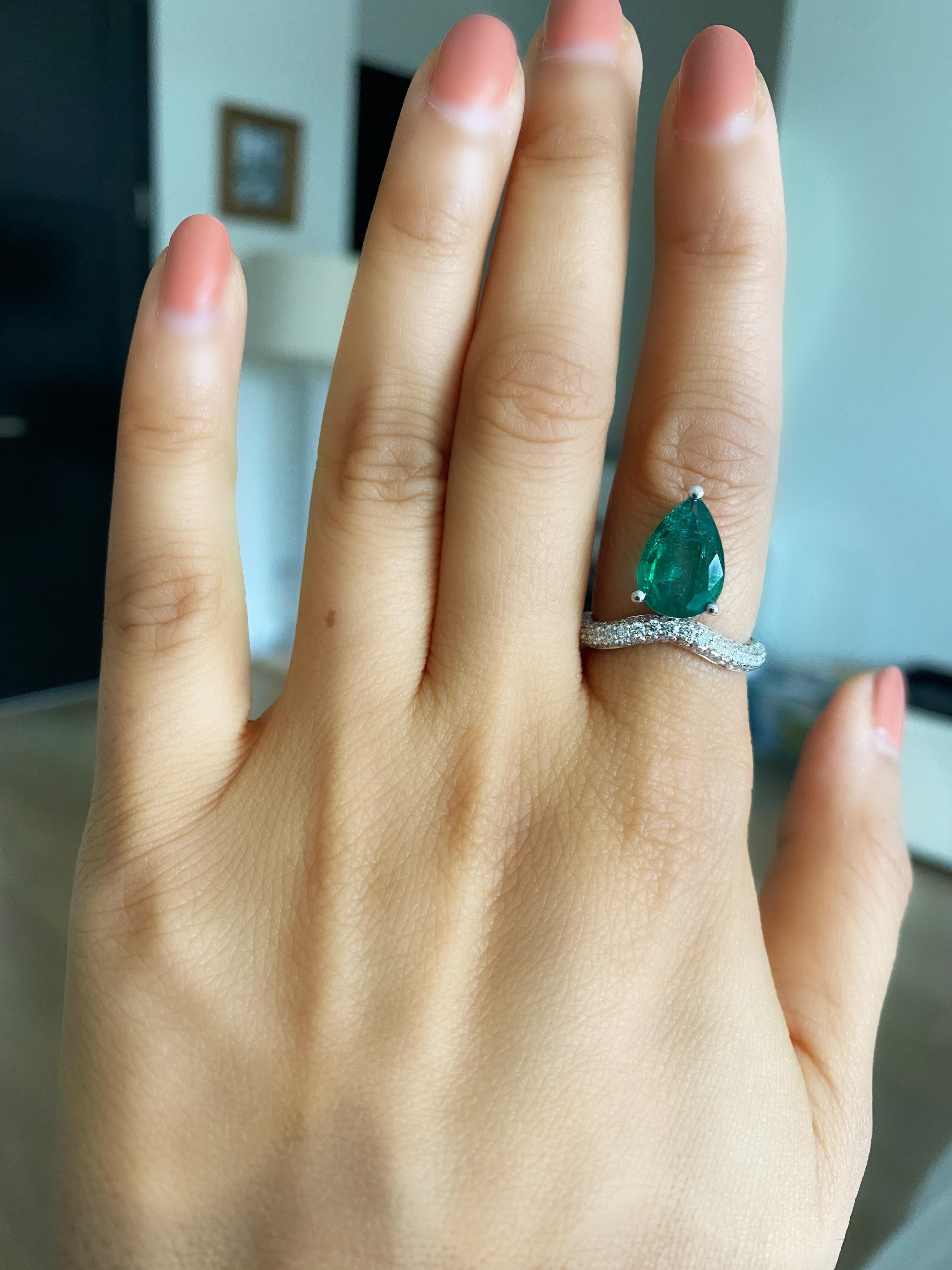 Emerald Cut Large Fancy 2.58 Pear shaped emerald solitaire and brilliant cut diamonds wave r