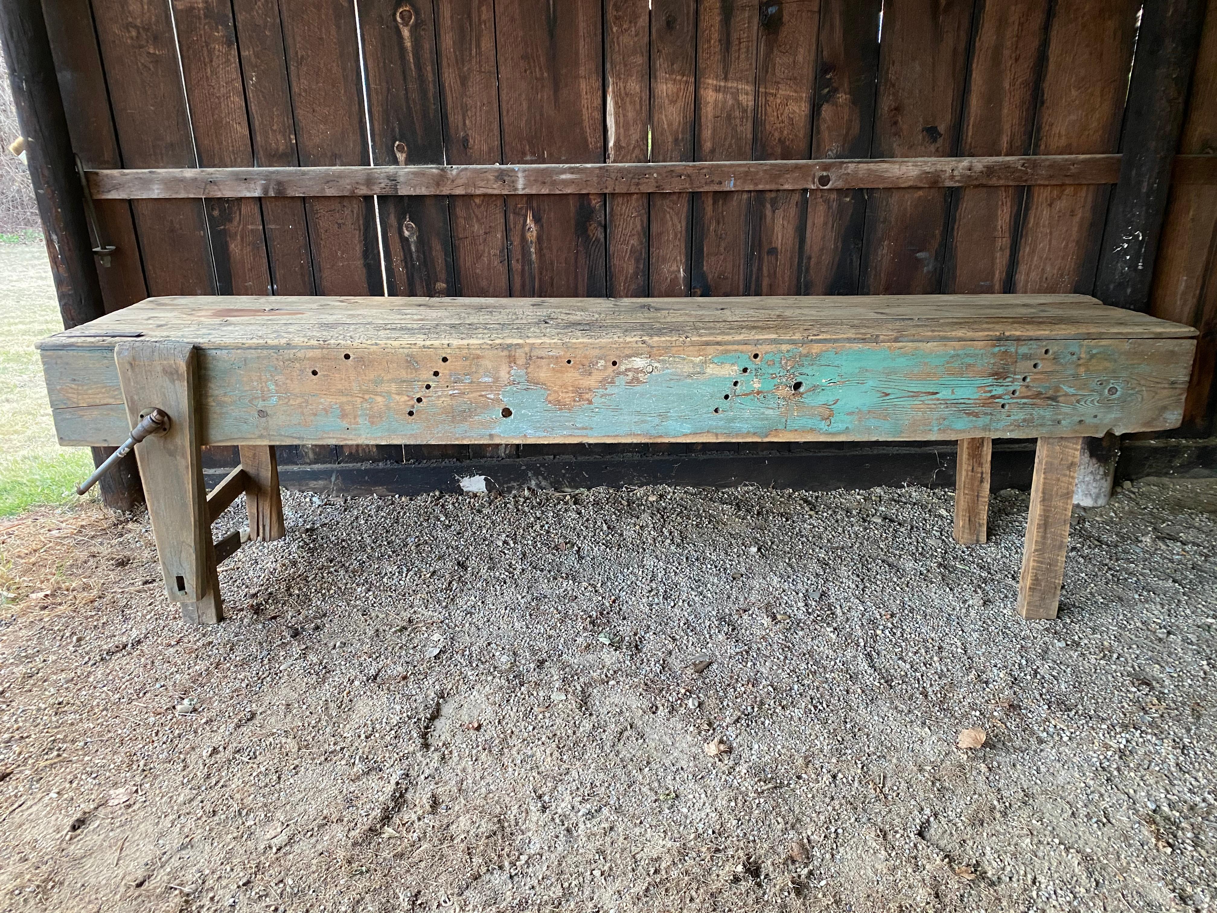 Nearly 10' in length, this Industrial work table will make a wonderful kitchen island, serving table or counter area.  Originally a woodworkers workbench, today use it in a modern or traditional setting, this table will add interest and character to