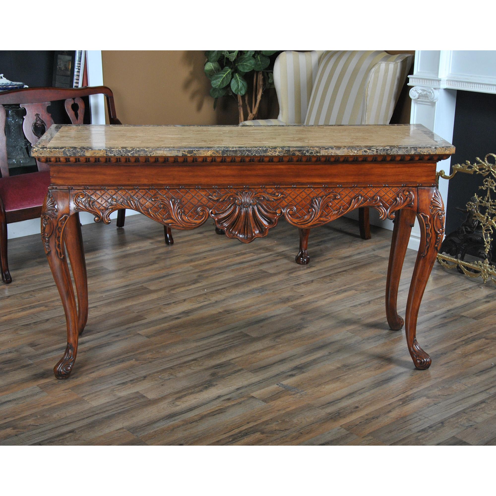 A Large Faux Marble Top Console brought to you by Niagara Furniture. This stylish piece has fantastic details throughout; all in the same original untouched condition as when it left the factory. The removable legs fit snugly into the top and create