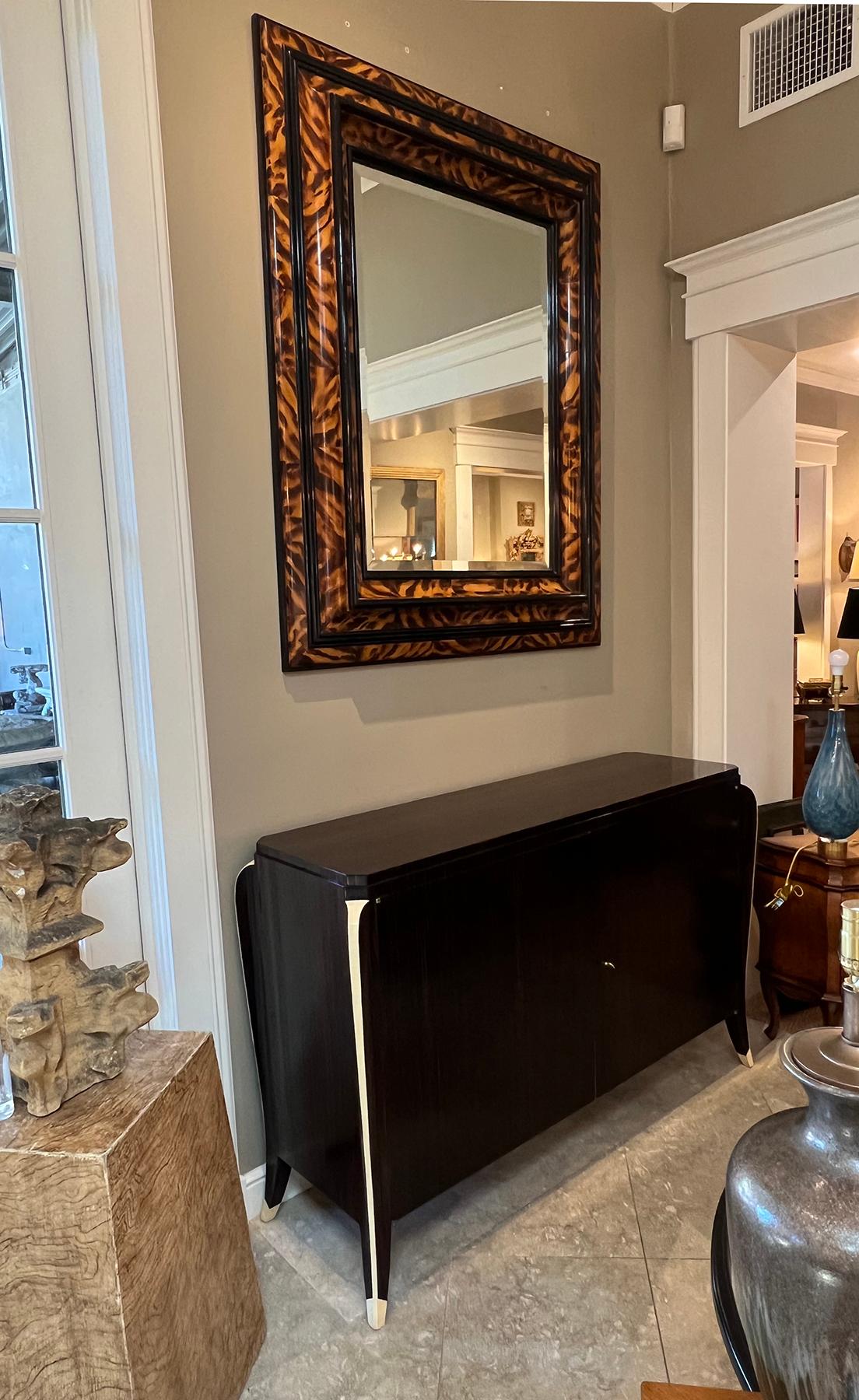 American Large Faux Tortoiseshell and Parcel-ebonized Mirror in the Flemish Style For Sale