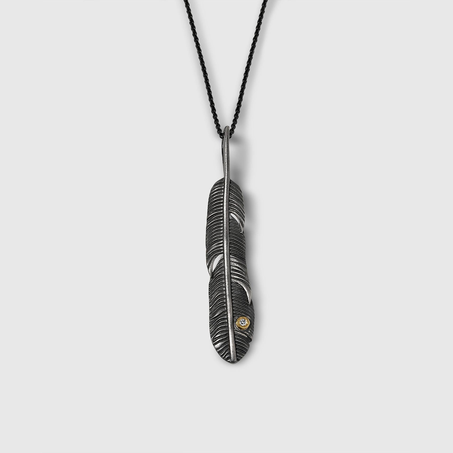 Feather Charm Pendant with Diamond, 24K and Sterling Silver, Handmade by Prehistoric Works of Istanbul, Turkey
Pendant Details:
Length - 2 1/5”
Width - 1/2”
24K Gold Bezel - 0.10 grams
Sterling S925 - 5.28 grams
Diamond - 0.02 ct
Pendant comes with
