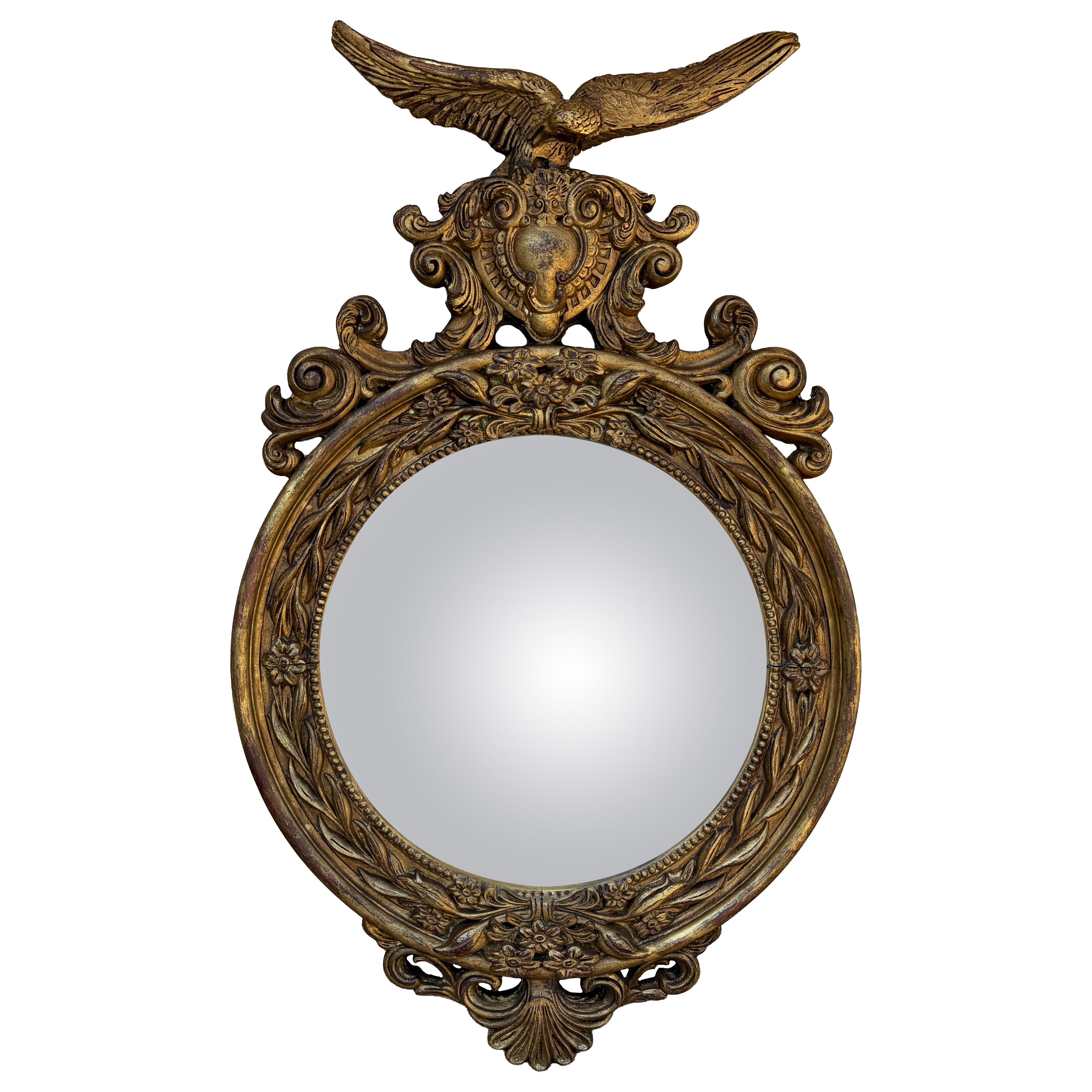 Grand miroir convexe fédéral orné d'un aigle en bois doré, XXe siècle