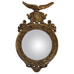 Espejo convexo grande con águila de madera dorada de estilo federal, siglo XX