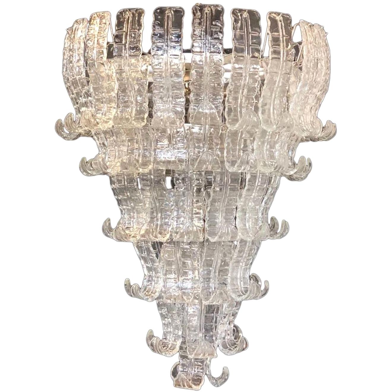 With precious Murano glass felci.
13-light bulbs E 14.
Measures: Height cm 130. plus chain and canopy.
Diameter cm 90.

