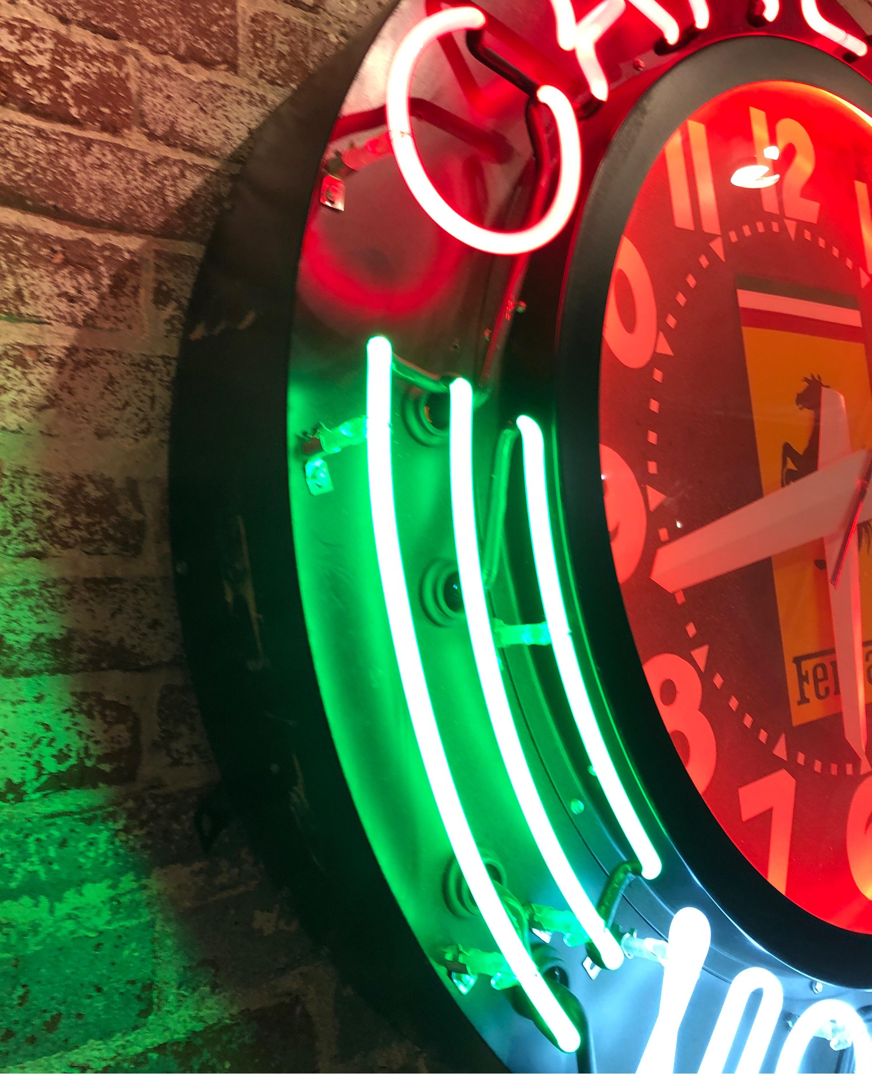 Large Ferrari logo neon sign and clock, circa 1980. In fantastic working condition with little to no damage. Clock is functioning well and all lights are bright and working. Amazing piece of vintage lighting for that special room!