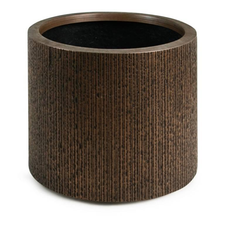 Sizable fiberglass planter by Forms + Surfaces. This impressive piece features scored vertical markings which decorate the bronze colored fiberglass exterior. This large planter is ready for use indoors or out. 

This grand plant pot would be a