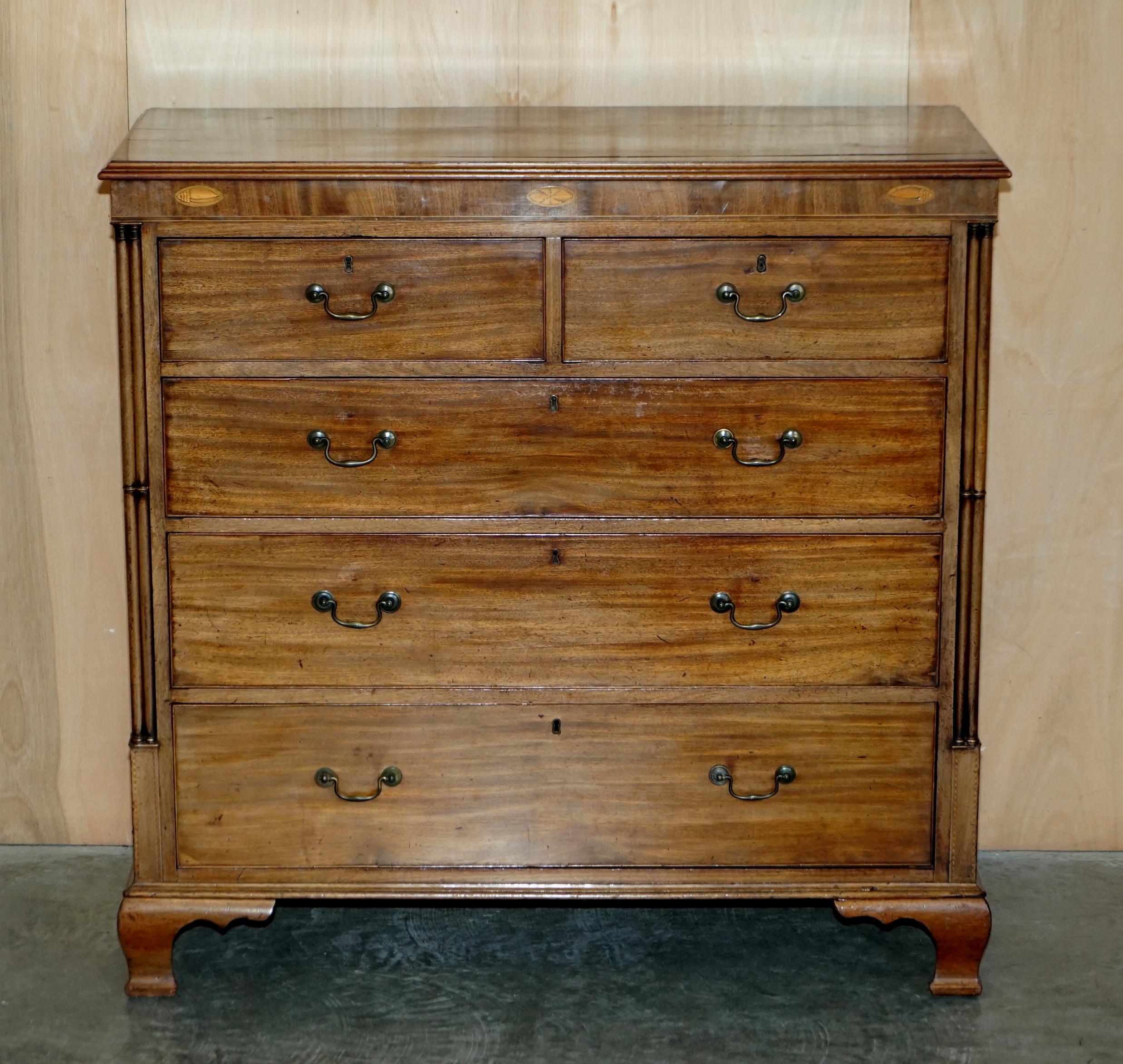Royal House Antiques

Royal House Antiques is delighted to offer for sale this very nice circa 1860-1880 oversized mahogany chest of drawers with Thomas Chippendale cluster column pillars and Sheraton revival inlay

Please note the delivery fee