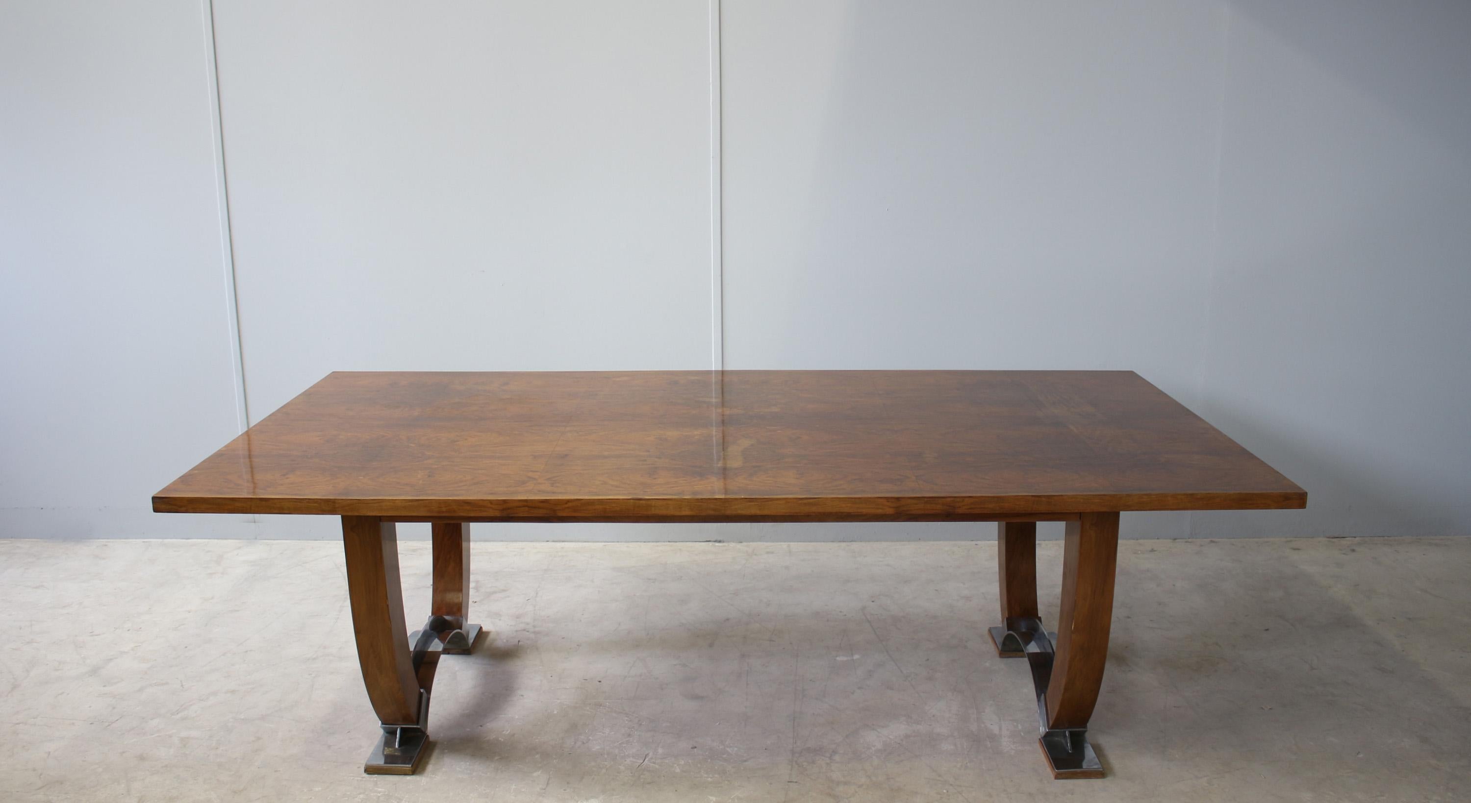 A large Fine French Art Deco modernist extendable walnut dining table with chrome details.
2 original end leaves, possibility for 2 more.
Documentation: 